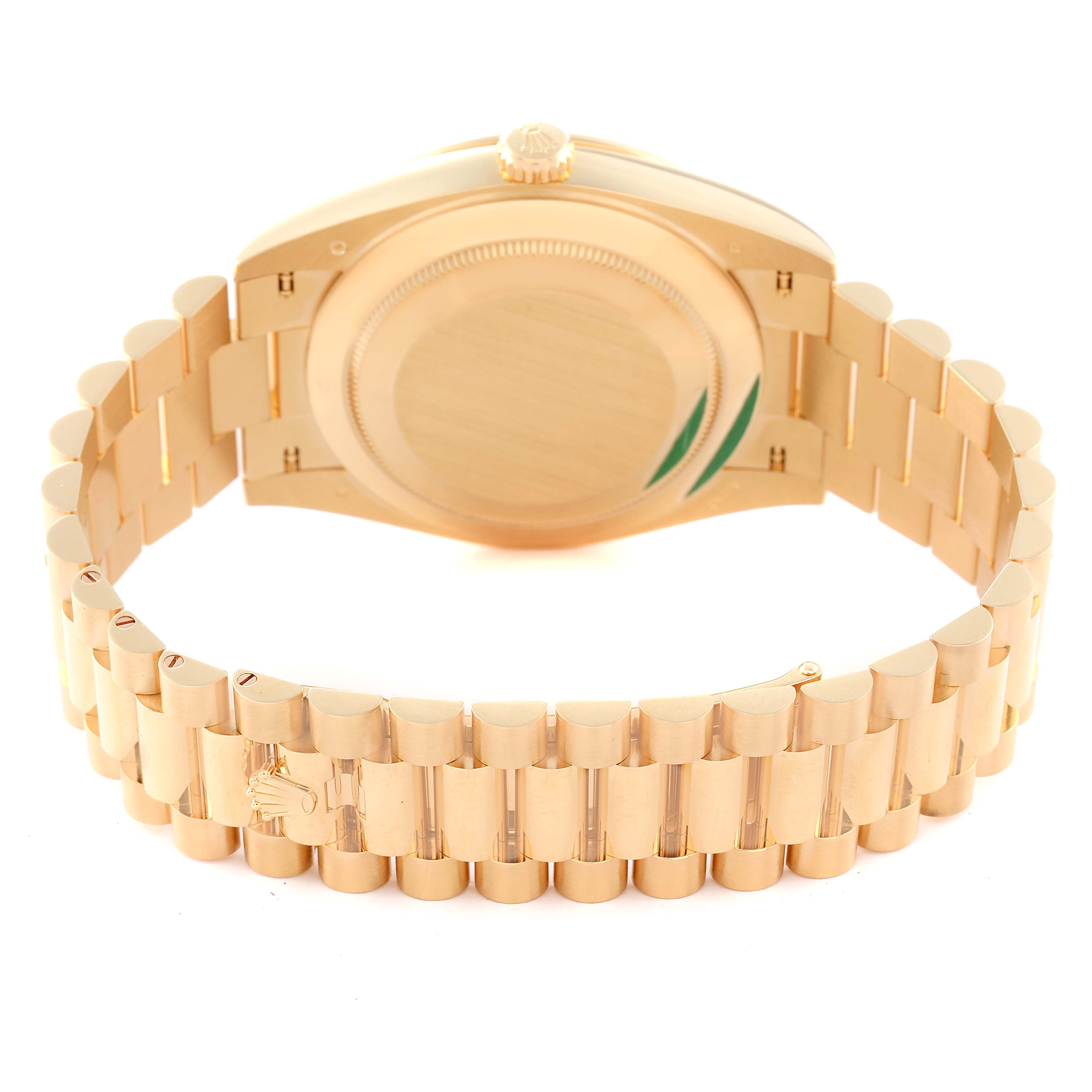 This image shows the back view of the Rolex President 228348 Men
s Yellow Gold White Dial 228348 Men
s Yellow Gold White Dial model watch, highlighting its case back, crown, and President bracelet.