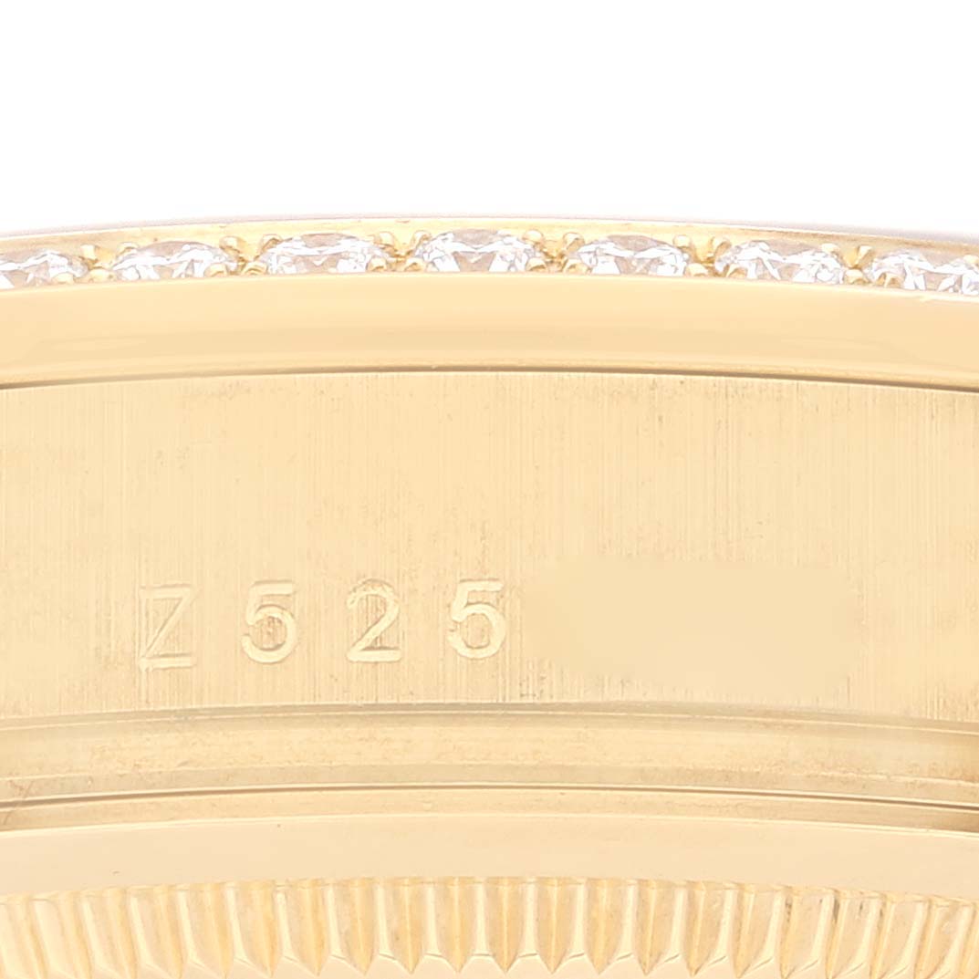 This is a close-up of the Rolex President 118348 Men
s Yellow Gold Champagne Dial 118348 Men
s Yellow Gold Champagne Dial model, showing the side of the case, the serial number, and part of the diamond bezel.
