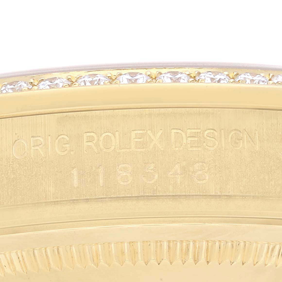 The image shows a close-up view of the bezel and case side of a Rolex President 118348 Men
s Yellow Gold Champagne Dial 118348 Men
s Yellow Gold Champagne Dial model watch.