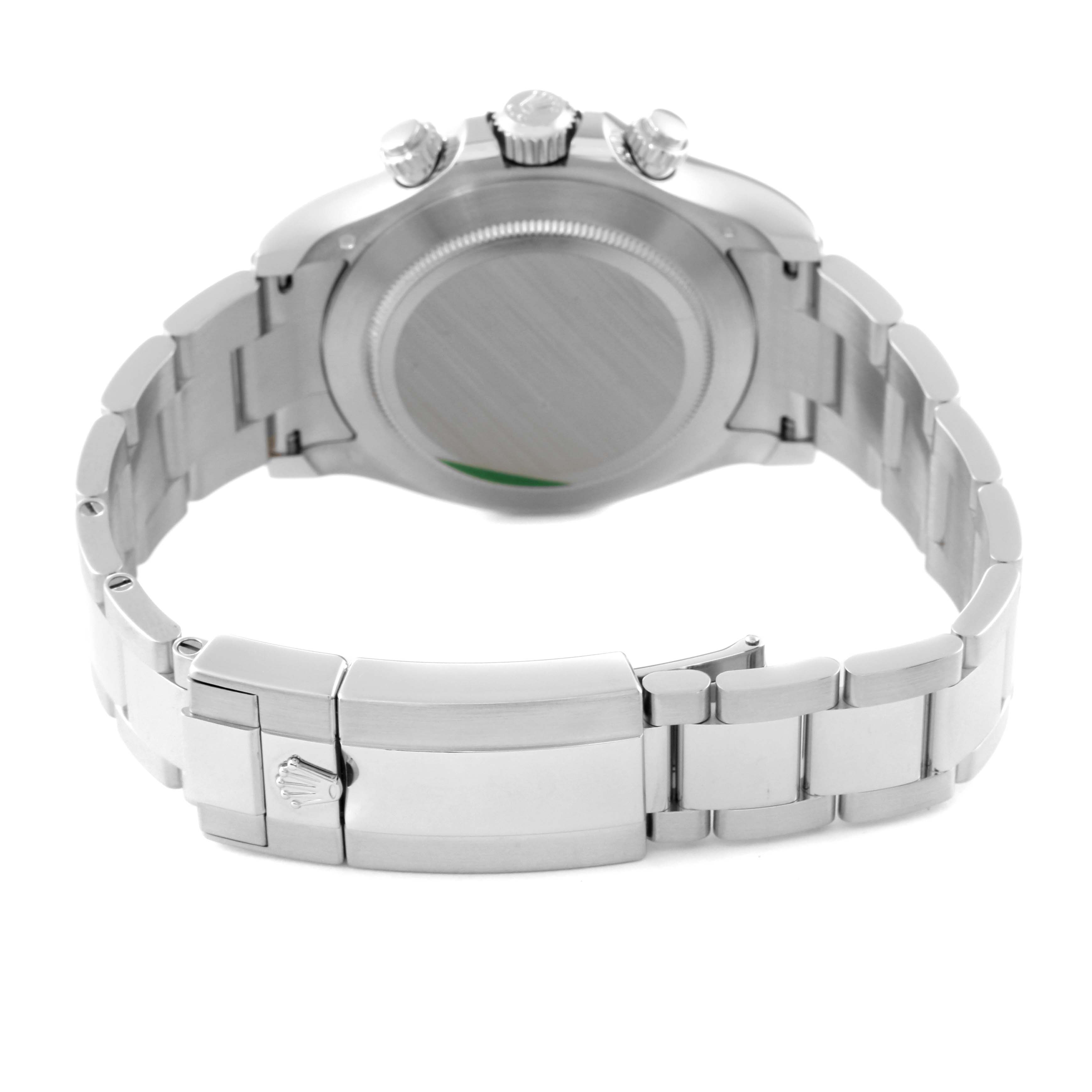 The image shows the back of a Rolex Daytona 116506 Men's Platinum Blue Dial 116506 Men's Platinum Blue Dial watch, highlighting the clasp and bracelet at a rear angle.