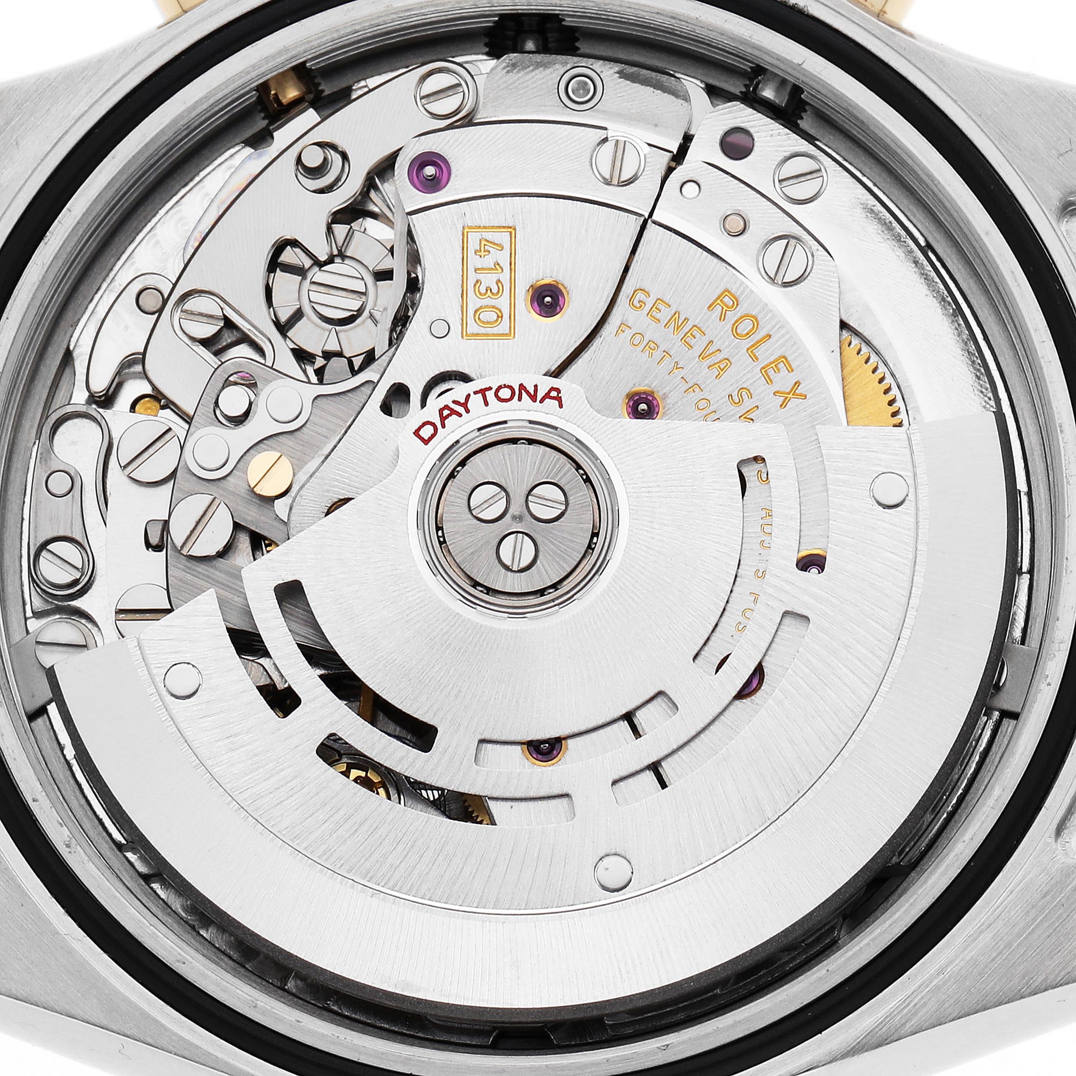 The image shows a close-up view of the Rolex Daytona 116523 Men's Steel and Gold (two tone) White Dial 116523 Men's Steel and Gold (two tone) White Dial's movement, featuring gears and the rotor.