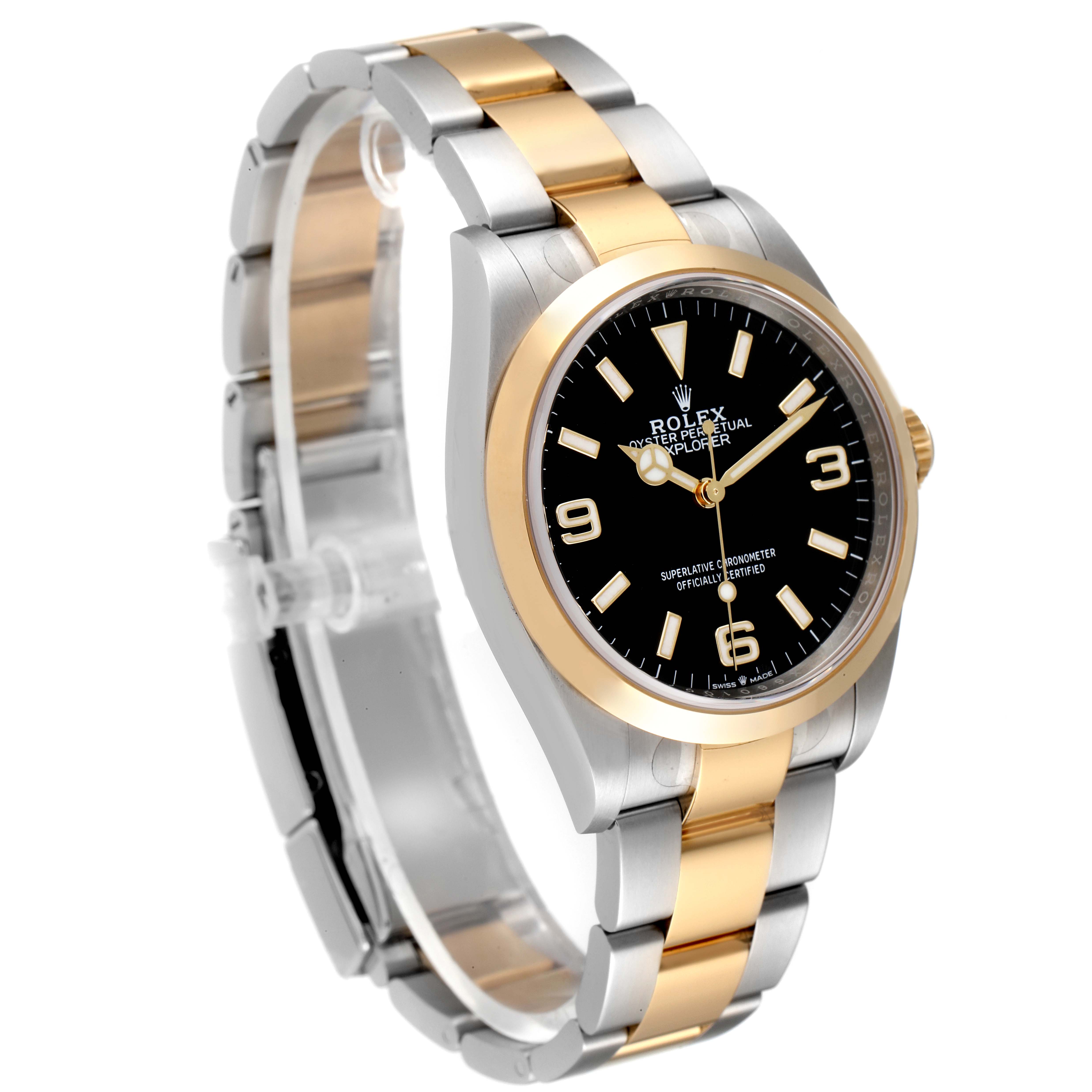 This image shows the Rolex Explorer 124273 Men
s Steel and Gold (two tone) Black Dial 124273 Men
s Steel and Gold (two tone) Black Dial watch at a three-quarter angle, highlighting its face, bezel, and bracelet.