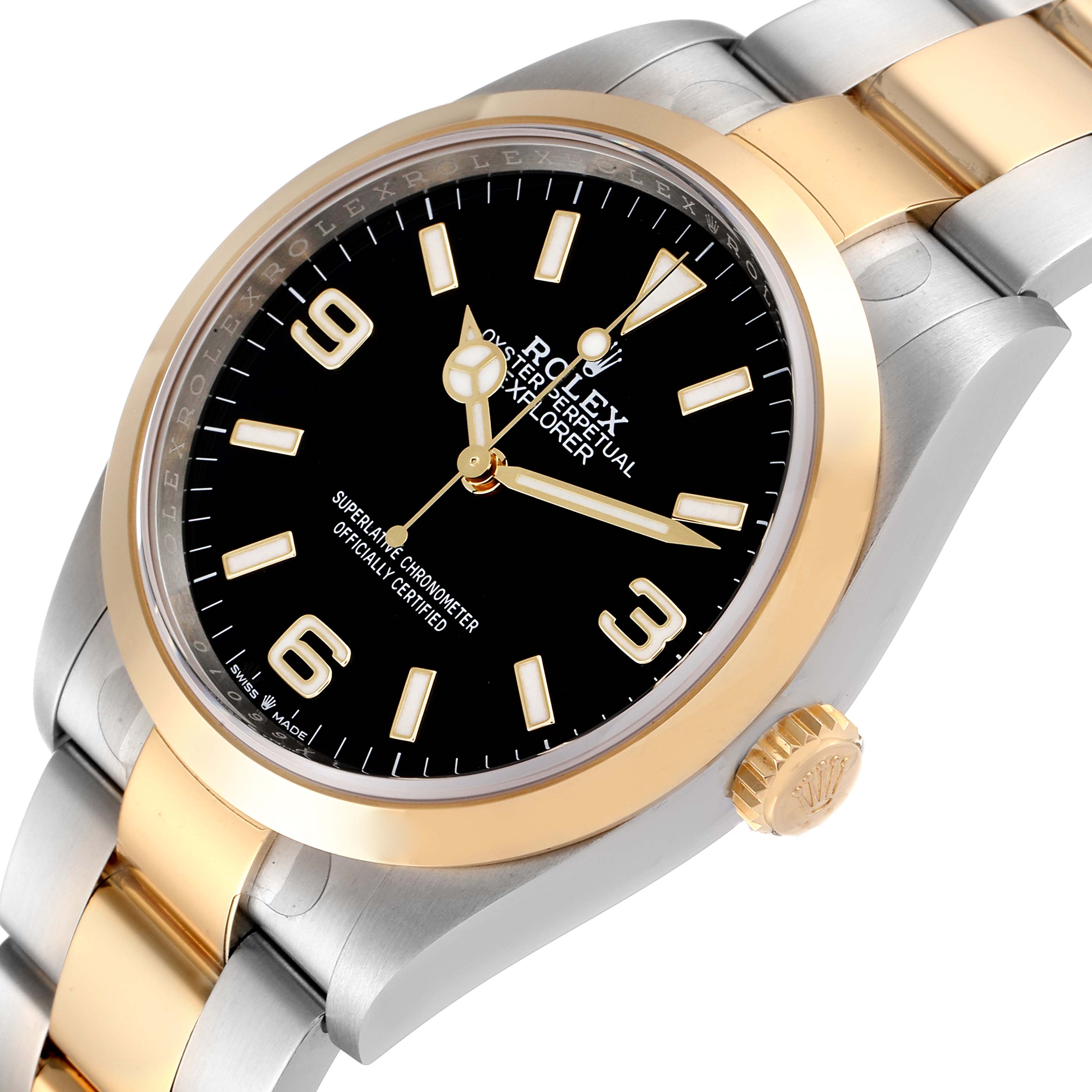 The image shows a Rolex Explorer 124273 Men
s Steel and Gold (two tone) Black Dial 124273 Men
s Steel and Gold (two tone) Black Dial watch from an angled view focusing on its face, bezel, and part of the bracelet.