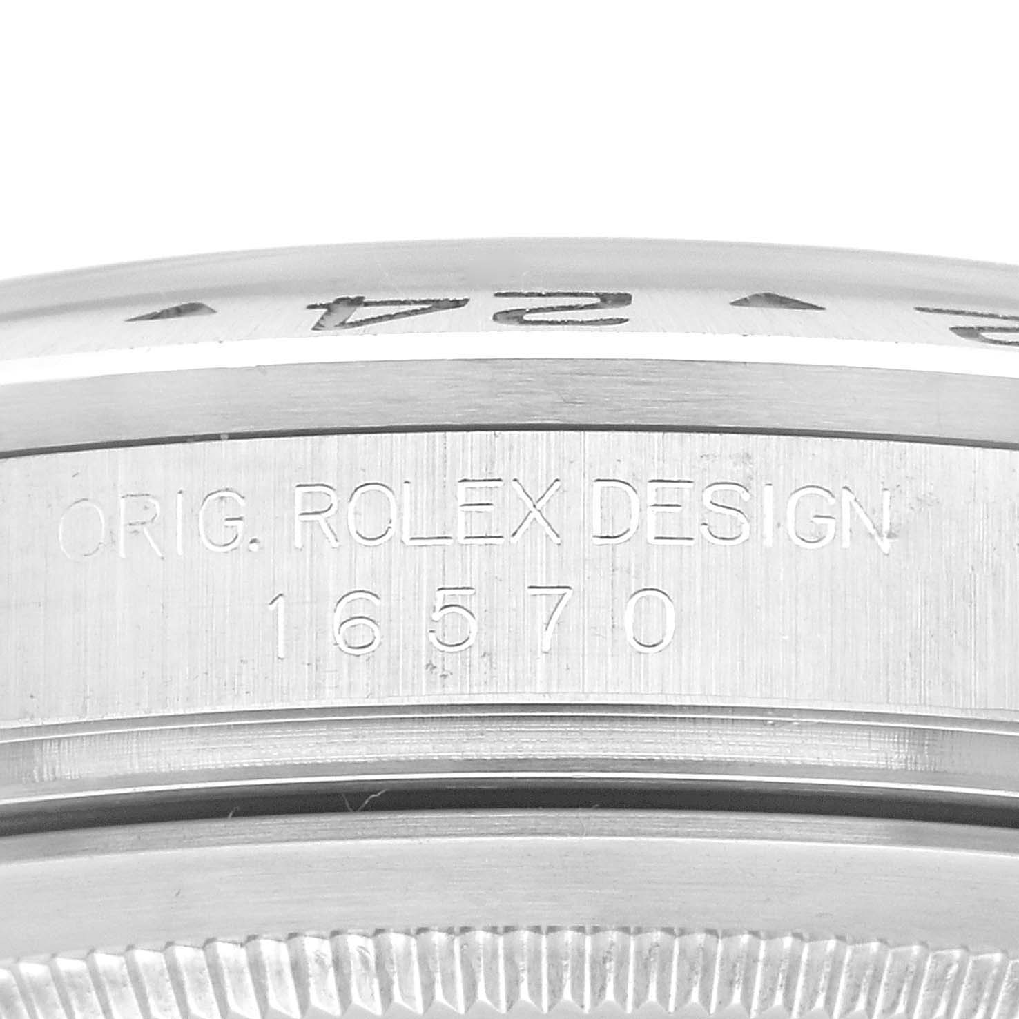 This close-up image shows the case side of an Explorer model by Rolex, highlighting the engraving "ORIG. ROLEX DESIGN 16570" and part of the bezel.