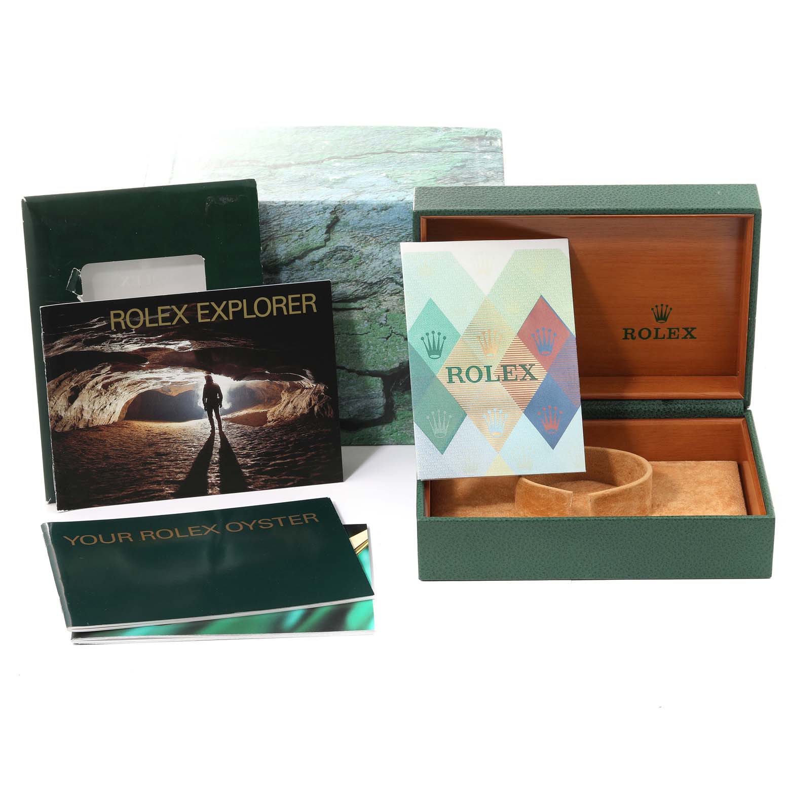 The image shows the packaging and accessories for a Rolex Explorer 16570 Men's Stainless Steel White Dial 16570 Men's Stainless Steel White Dial watch, including the box, booklets, and warranty card holder.