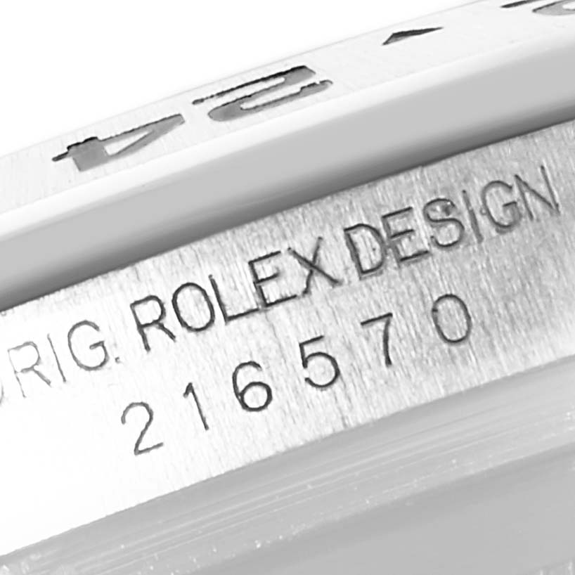 The image shows a close-up view of the model number and branding engraved on the rim of a Rolex Explorer 216570 Men
s Stainless Steel Black Dial 216570 Men
s Stainless Steel Black Dial watch.