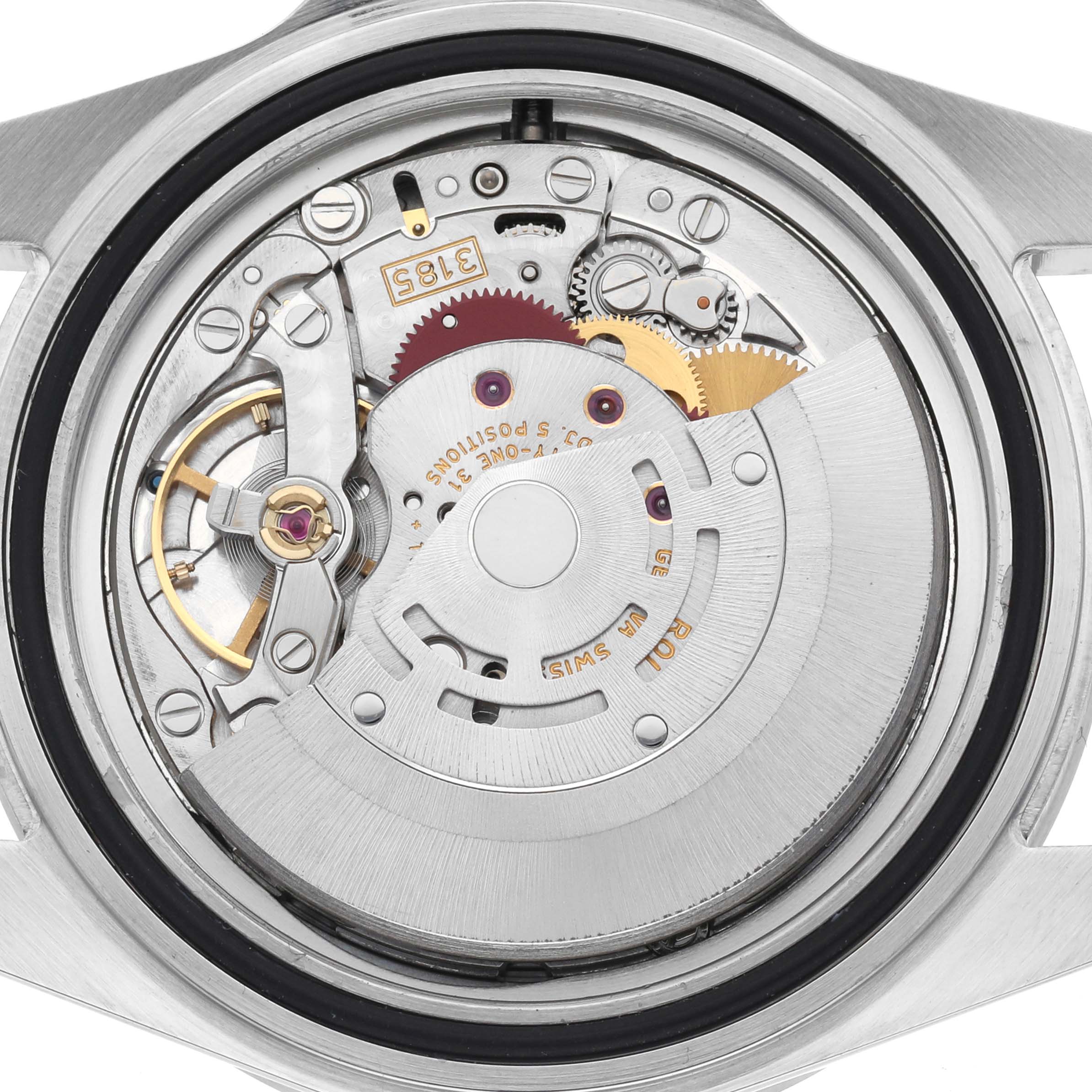 The image shows the movement from the back of a Rolex Explorer 16570 Men's Stainless Steel White Dial 16570 Men's Stainless Steel White Dial watch, highlighting gears and mechanical components.