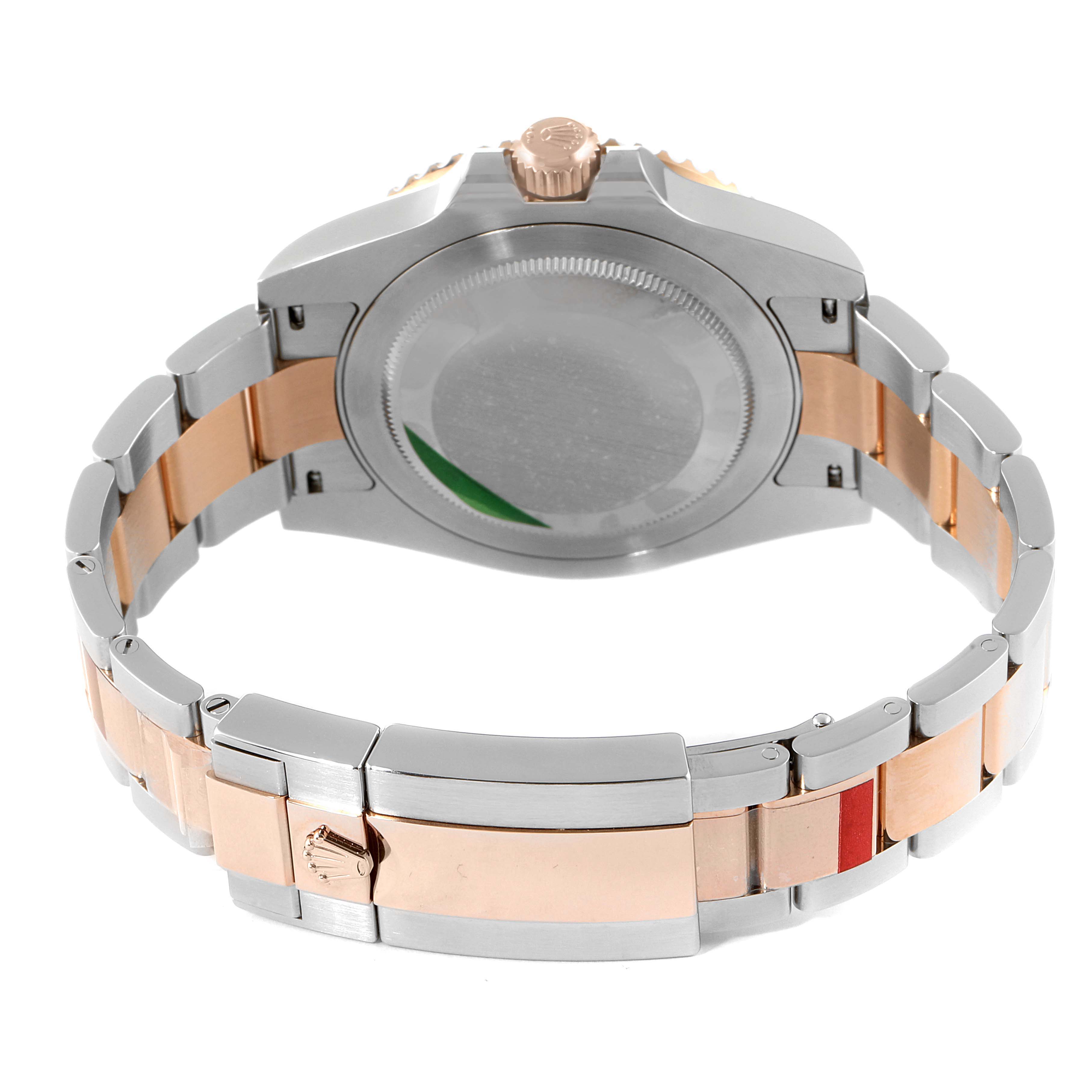 The image shows the back view of a Rolex GMT-Master 126711CHNR Men's Steel and Gold (two tone) Black Dial 126711CHNR Men's Steel and Gold (two tone) Black Dial watch, highlighting the case back and bracelet.