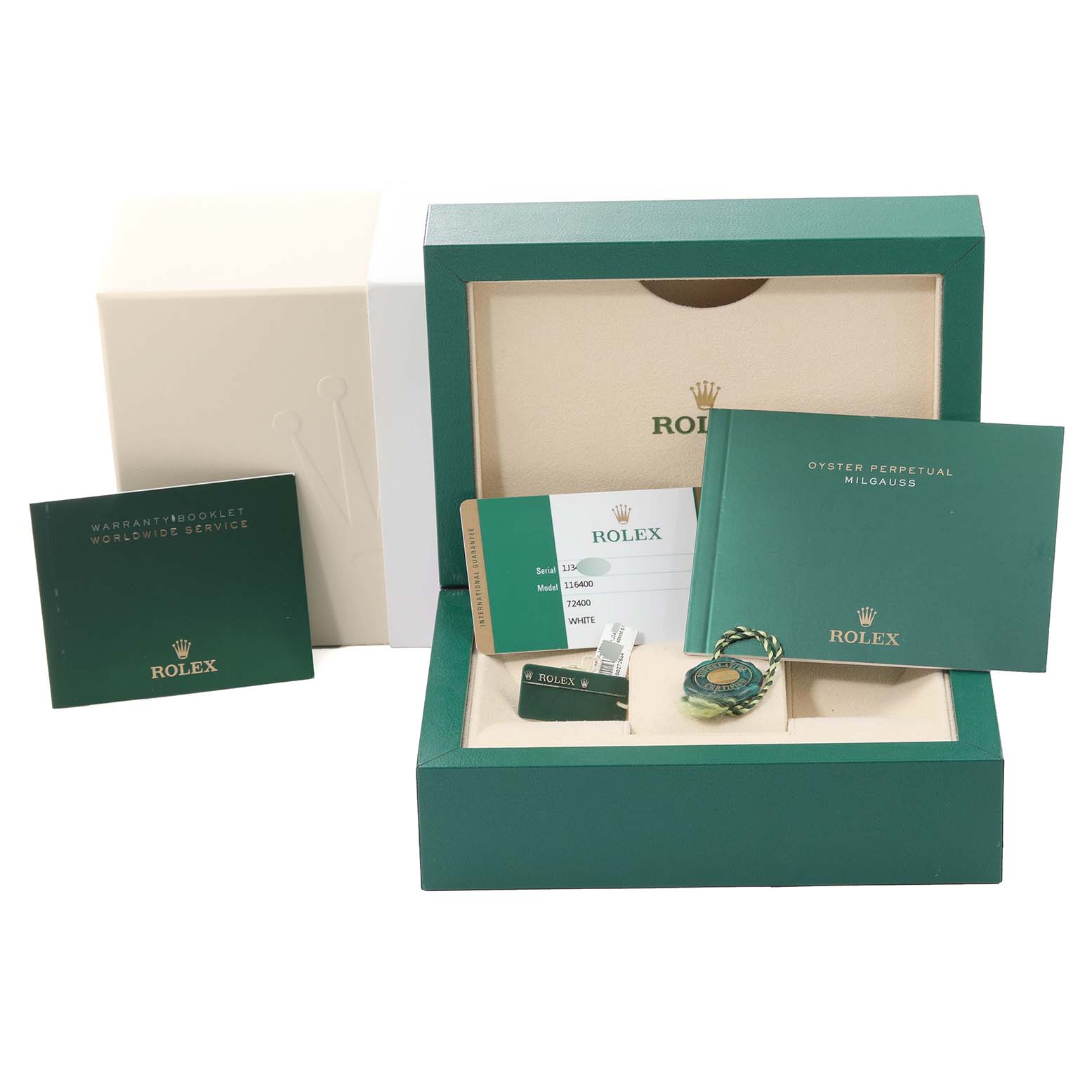 This image shows the box, warranty booklet, manual, tag, and card for a Rolex Milgauss 116400 Men's Stainless Steel White Dial 116400 Men's Stainless Steel White Dial watch.