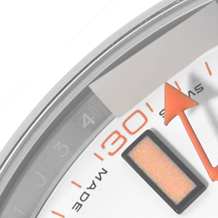 This close-up angle shows a segment of the dial and orange markers of the Rolex Milgauss 116400 Men's Stainless Steel White Dial 116400 Men's Stainless Steel White Dial watch.