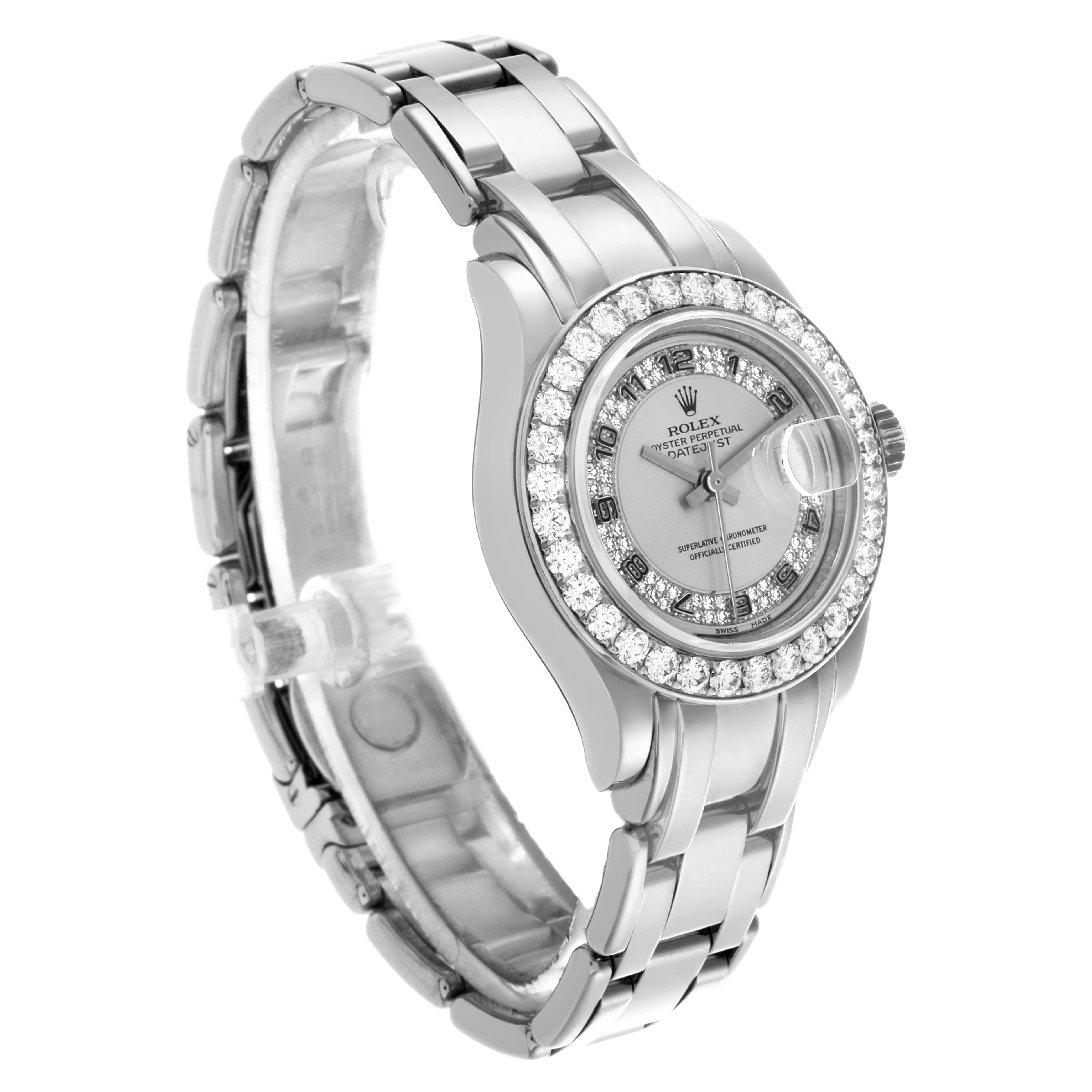 The Rolex Pearlmaster 80299 Women
s White Gold Silver Dial 80299 Women
s White Gold Silver Dial watch is shown at a three-quarter angle, highlighting the bracelet, diamond bezel, and face details.
