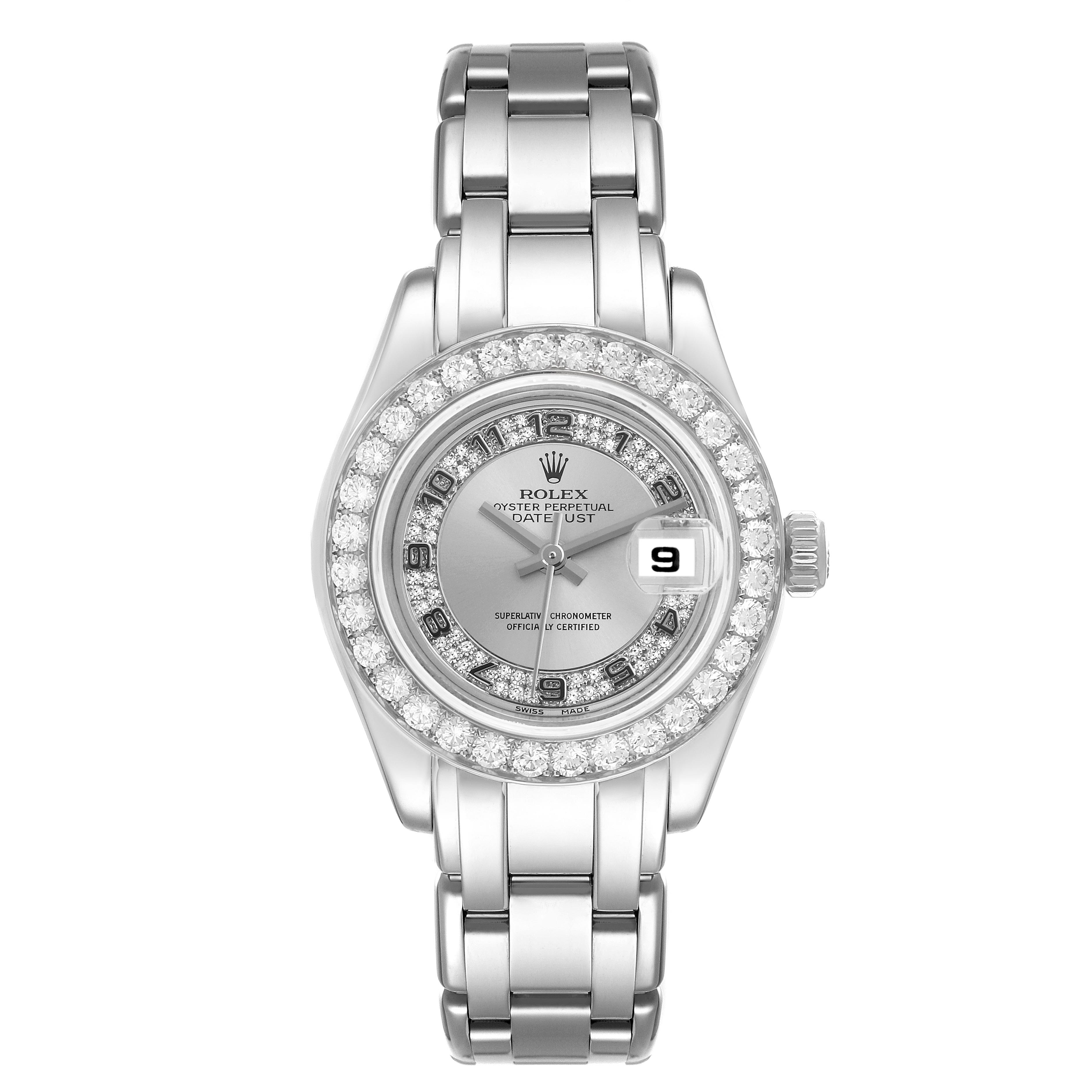 The Rolex Pearlmaster 80299 Women
s White Gold Silver Dial 80299 Women
s White Gold Silver Dial watch is shown from a front angle, highlighting its diamond bezel, bracelet, and silver dial.