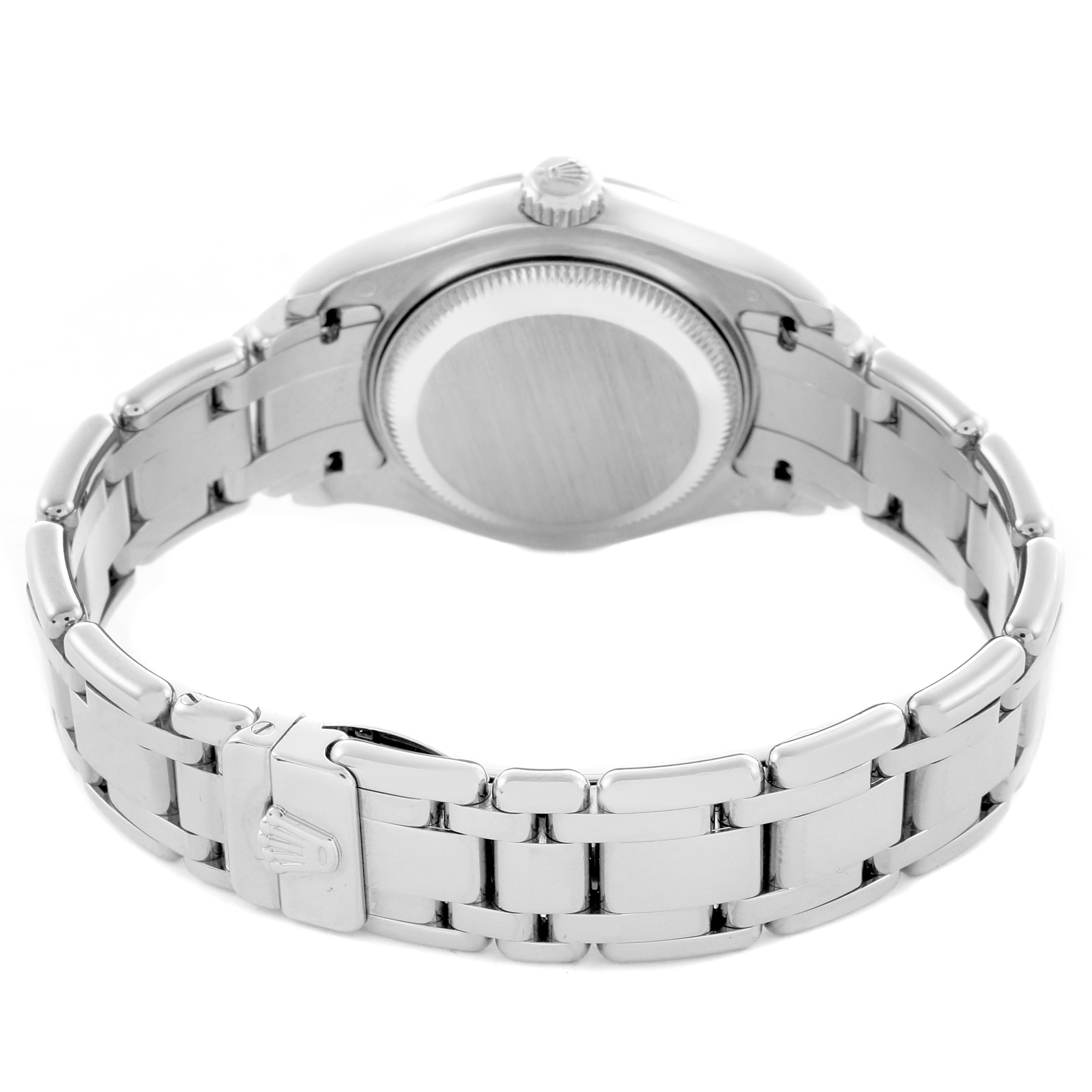 The Rolex Pearlmaster 80299 Women
s White Gold Silver Dial 80299 Women
s White Gold Silver Dial watch is shown from the back, highlighting the case back, bracelet, and clasp.