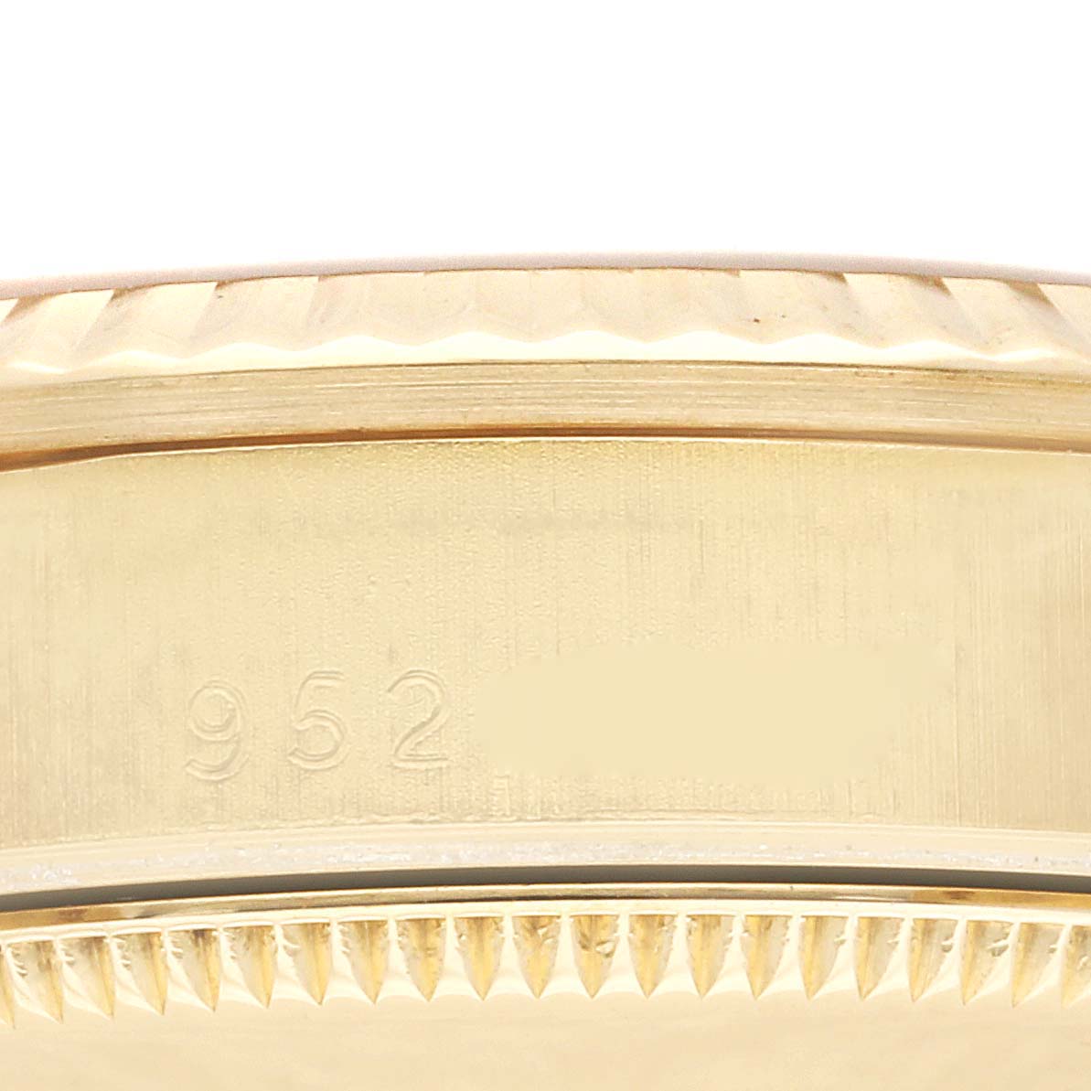 This close-up image shows the engraved side and fluted bezel of a Rolex President 68278 Women
s Yellow Gold Champagne Dial 68278 Women
s Yellow Gold Champagne Dial model watch.