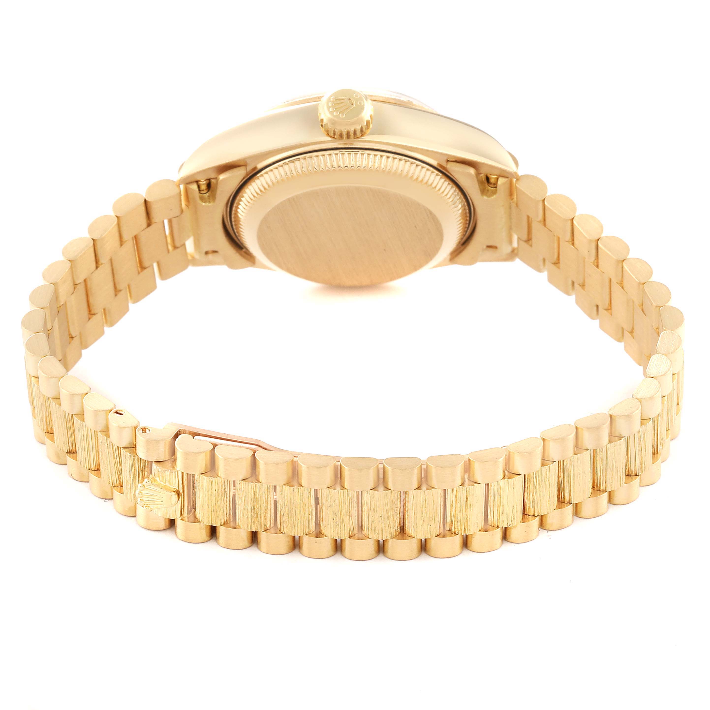 This image shows the back and band of a Rolex President 79278 Women's Yellow Gold Champagne Dial 79278 Women's Yellow Gold Champagne Dial model watch, highlighting its gold bracelet and caseback.