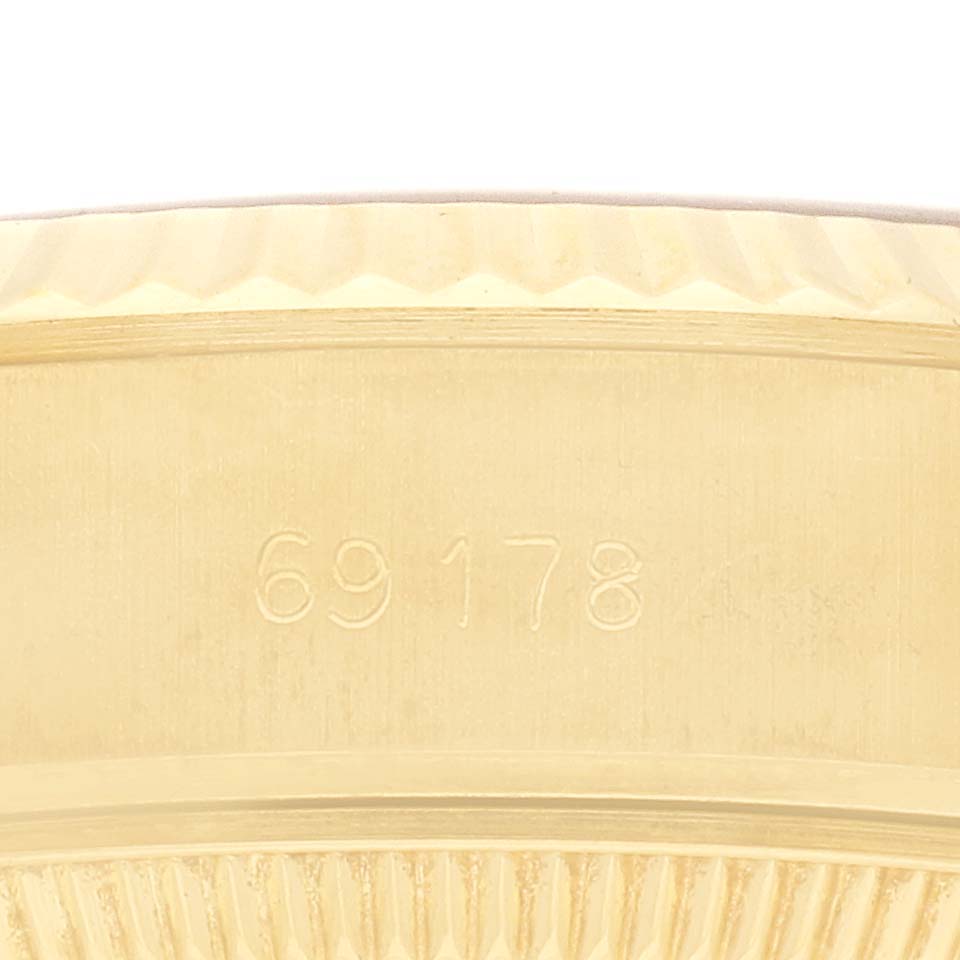 The image shows a close-up of the model number engraving on the side of the Rolex President 69178 Women's Yellow Gold Champagne Dial 69178 Women's Yellow Gold Champagne Dial watch case.