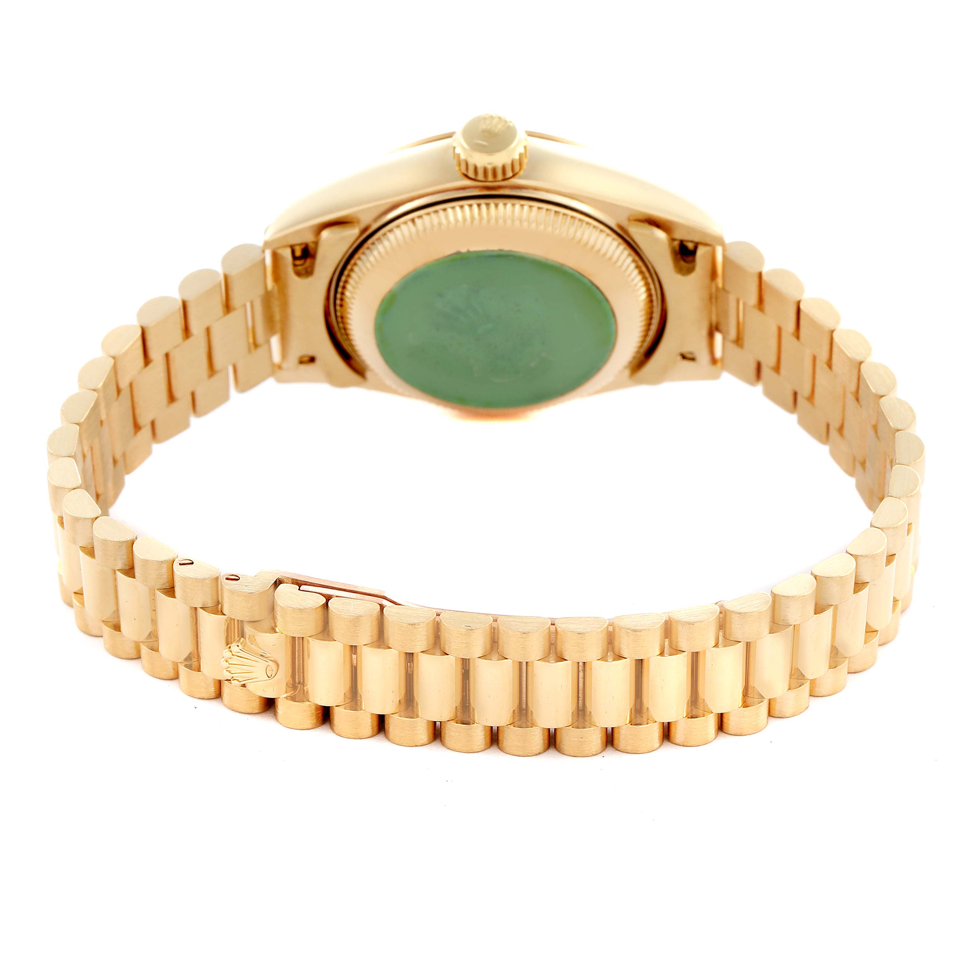 The image shows the reverse side of a Rolex President 69178 Women's Yellow Gold Champagne Dial 69178 Women's Yellow Gold Champagne Dial watch, highlighting the gold bracelet and case back.