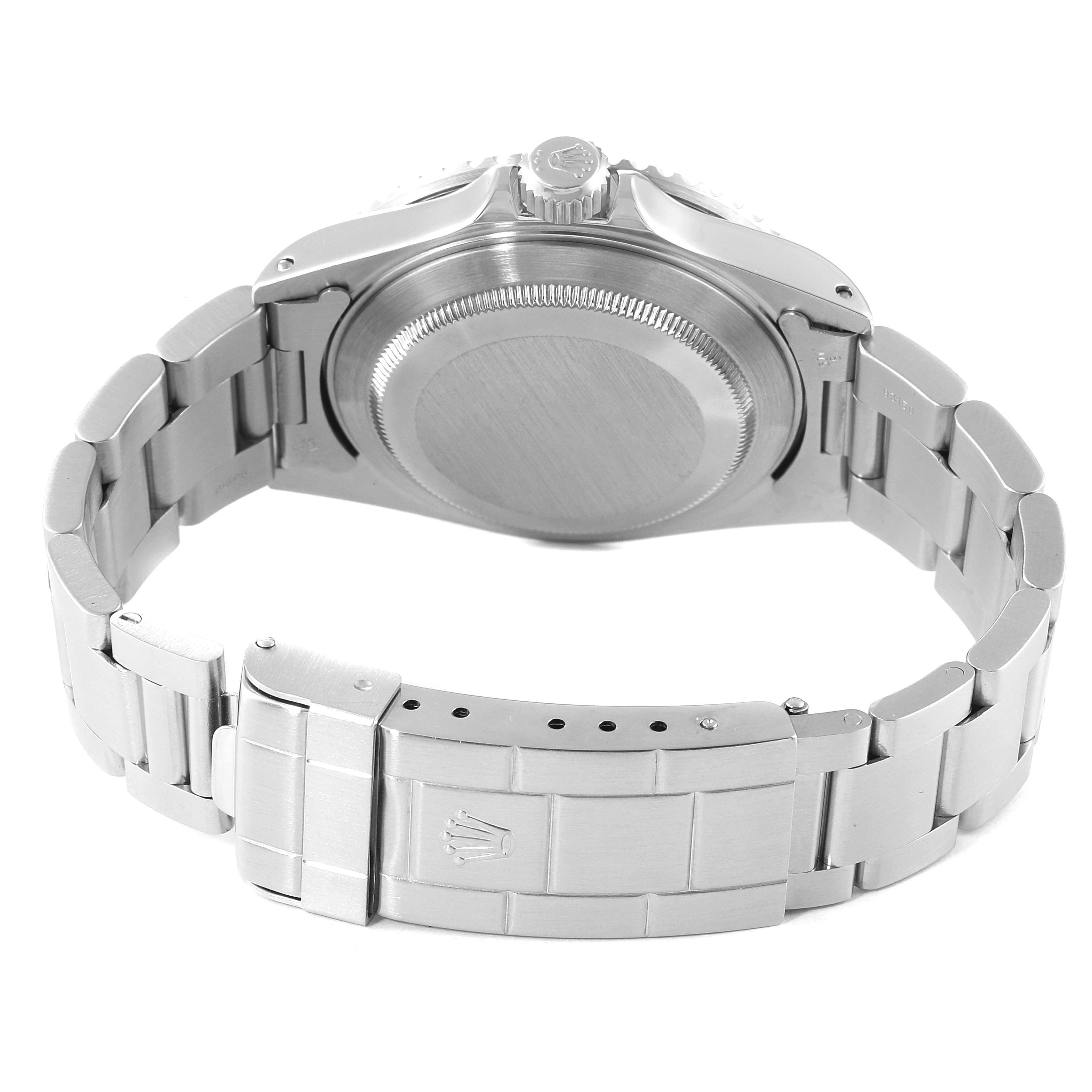 The image shows the back view of a Rolex Submariner 16610 Men
s Stainless Steel Black Dial 16610 Men
s Stainless Steel Black Dial watch, including the case back, bracelet, and clasp.