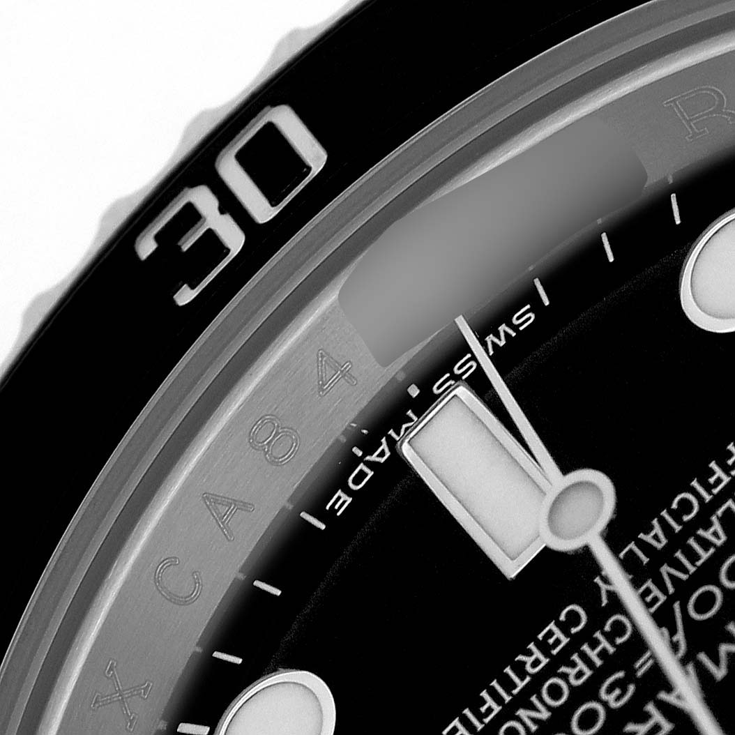 The image shows a close-up of the Rolex Submariner 116610LN Men's Stainless Steel Black Dial's bezel and part of the dial, focusing on the numeral "30" and nearby indices.