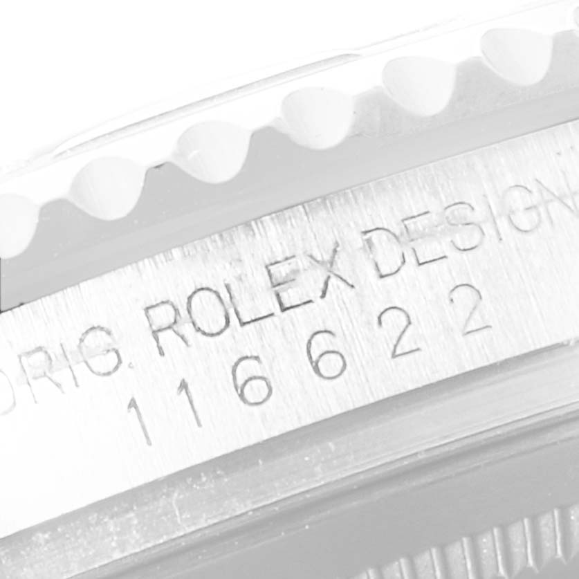 This close-up image shows the side engraving of a Rolex Yacht-Master 116622 Men's Stainless Steel Blue Dial 116622 Men's Stainless Steel Blue Dial, revealing "ORIG. ROLEX DESIGN" and the model number.