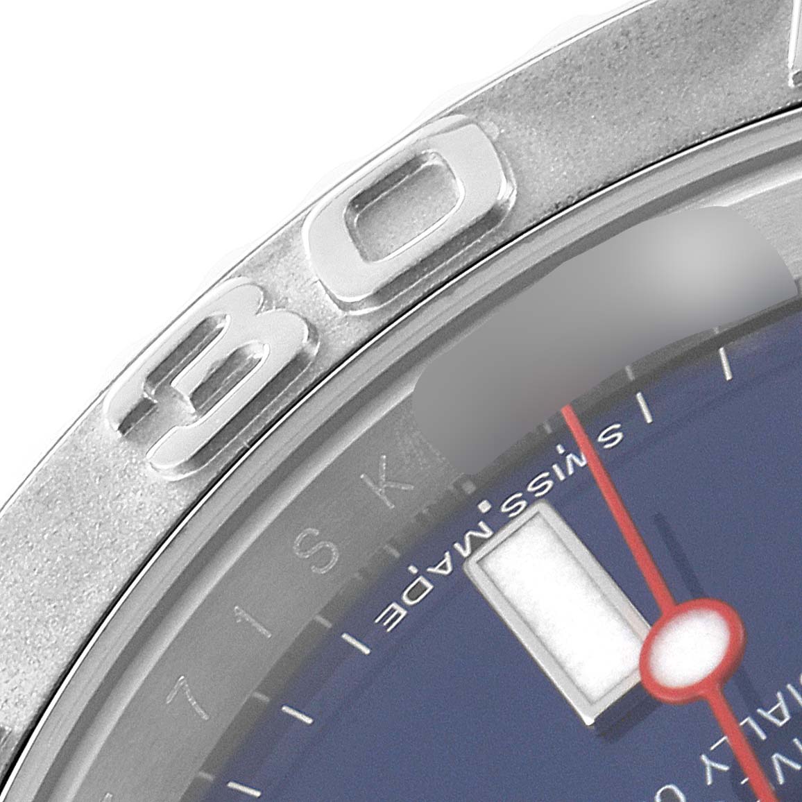 The close-up shows the bezel, part of the dial, and minute markers on the Yacht-Master model by Rolex.