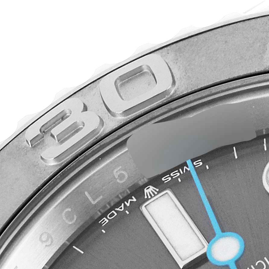 The image shows a close-up of the bezel and partial dial of a Rolex Yacht-Master 126622 Men
s Stainless Steel Grey Dial 126622 Men
s Stainless Steel Grey Dial watch, focusing on the "30" marker and minute hand.