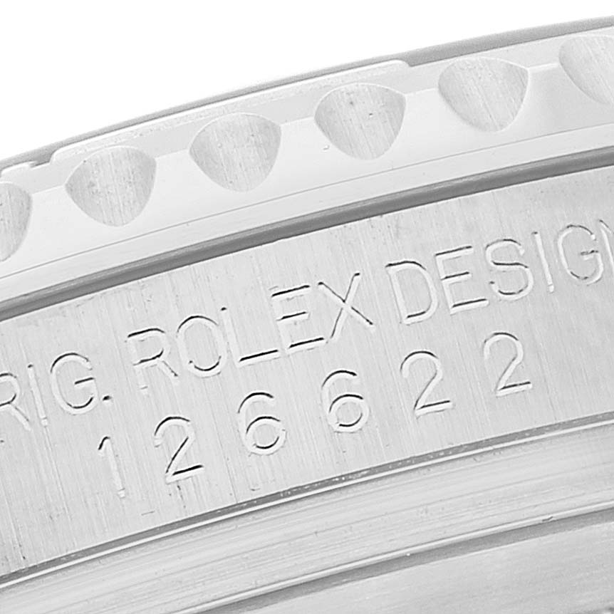 The image shows a close-up of the engraved bezel and casing of a Rolex Yacht-Master 126622 Men
s Stainless Steel Grey Dial 126622 Men
s Stainless Steel Grey Dial watch.