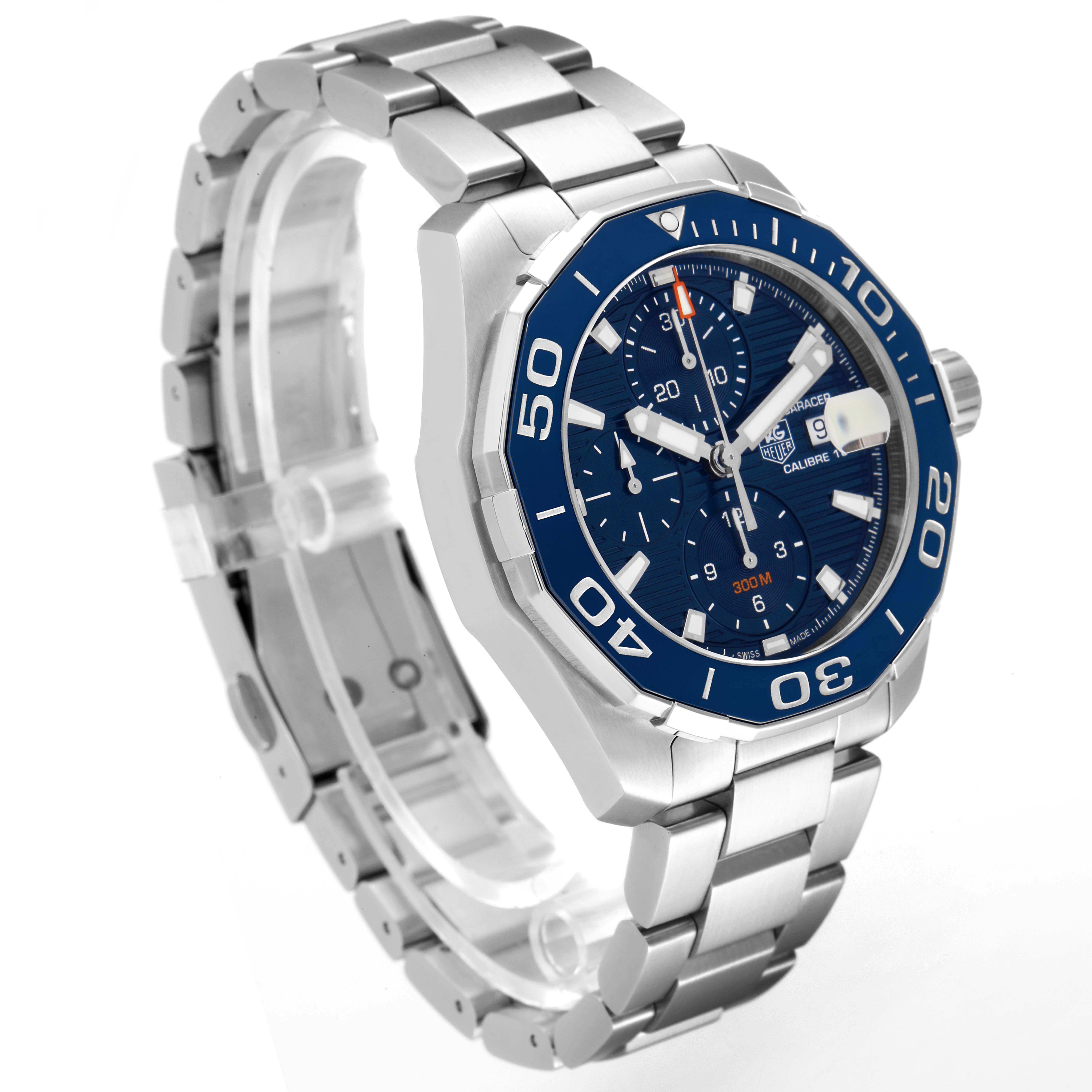 The image shows a Tag Heuer Aquaracer CAY211B.BA0927 Men's Stainless Steel Blue Dial CAY211B.BA0927 Men's Stainless Steel Blue Dial watch from a side angle, highlighting its blue dial, bezel, and stainless steel bracelet.