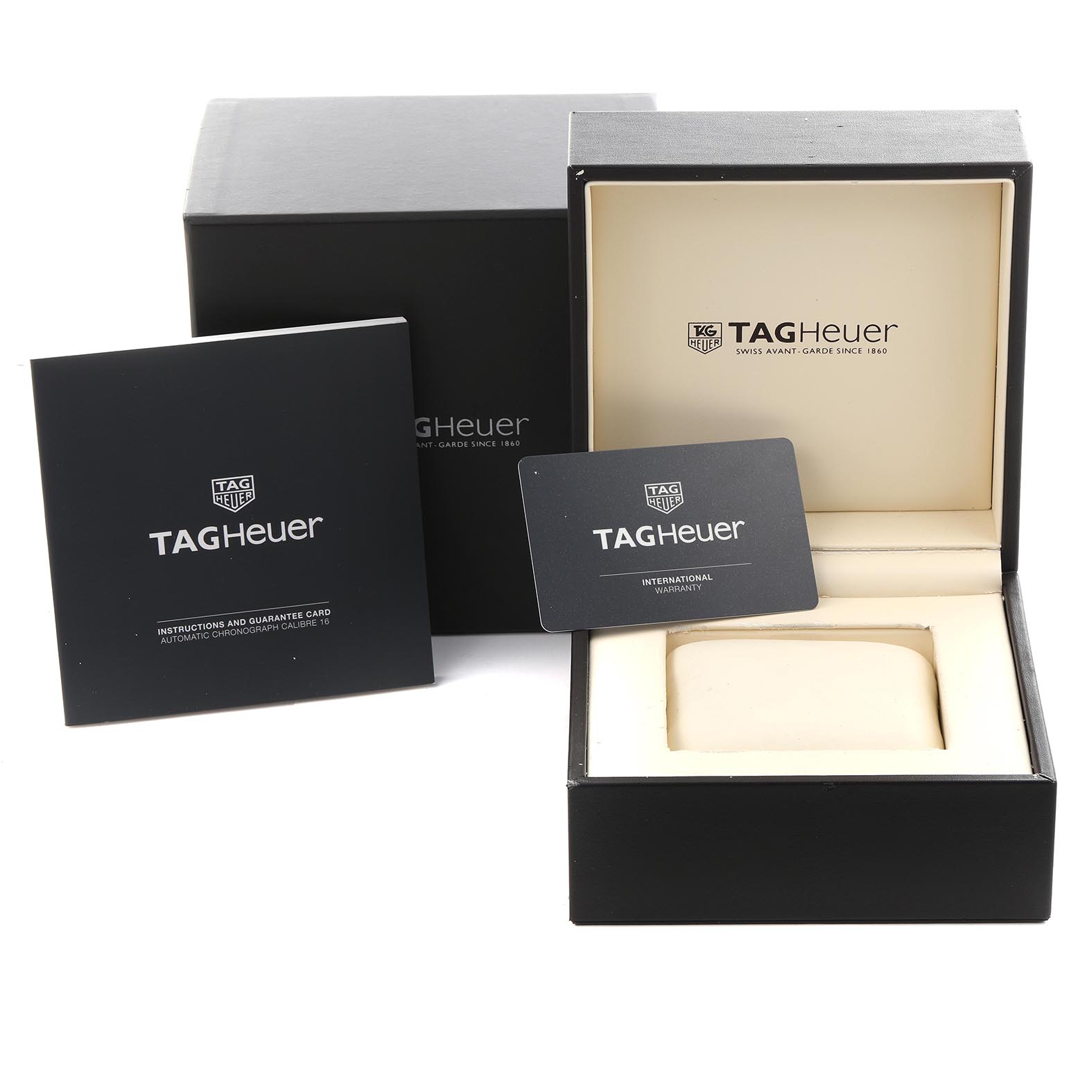 The image shows a Tag Heuer Aquaracer CAK2112.BA0833 Men's Stainless Steel Blue Dial CAK2112.BA0833 Men's Stainless Steel Blue Dial watch box, open with a cushion, and accompanying manuals and cards.