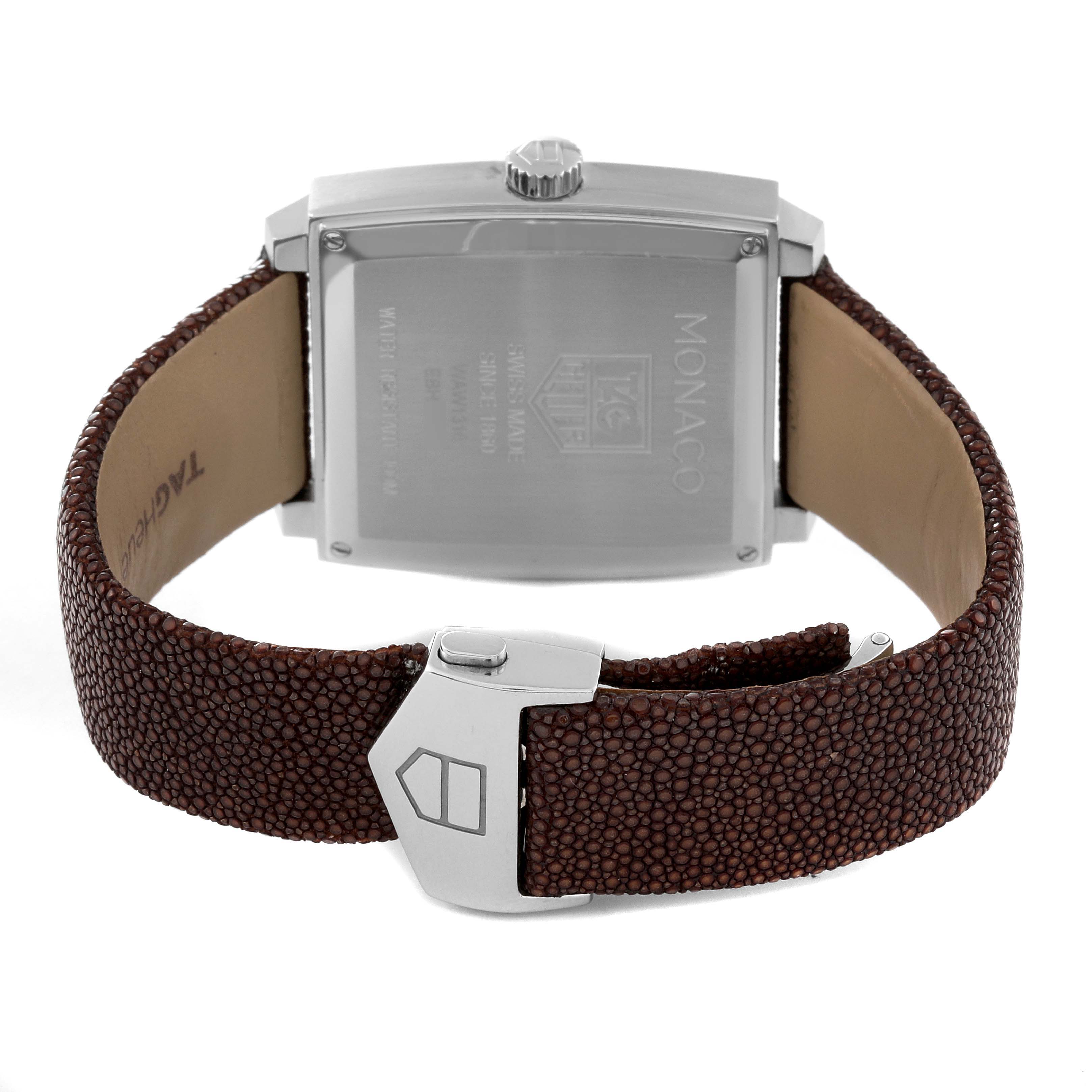 This image shows the back of the Tag Heuer Monaco WAW1316 Women's Stainless Steel Brown Dial WAW1316 Women's Stainless Steel Brown Dial watch and its brown textured strap with clasp.