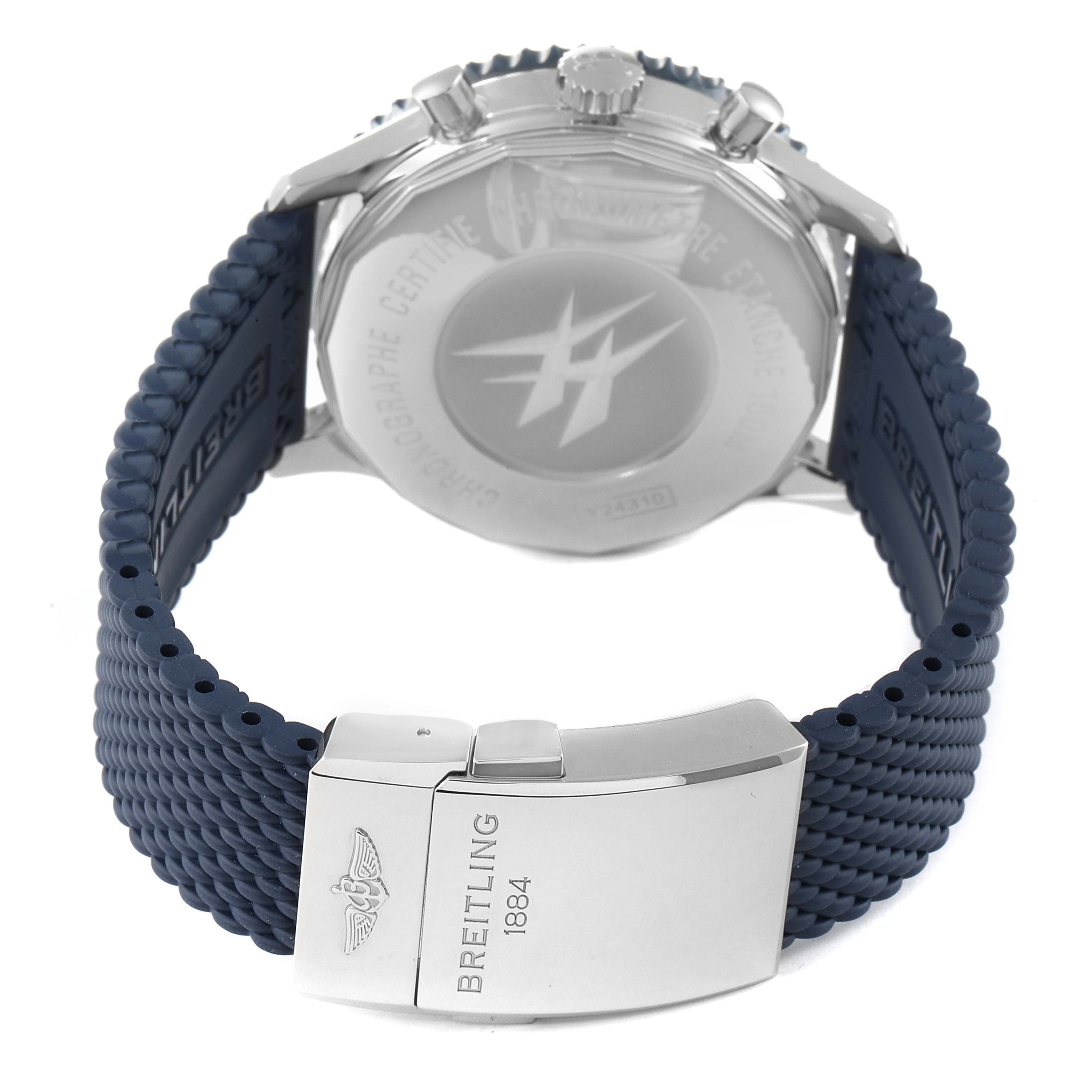 The image shows the back of the Breitling Chronoliner Y24310 Men's Stainless Steel Blue Dial Y24310 Men's Stainless Steel Blue Dial watch and its clasp, highlighting the case back and blue strap.
