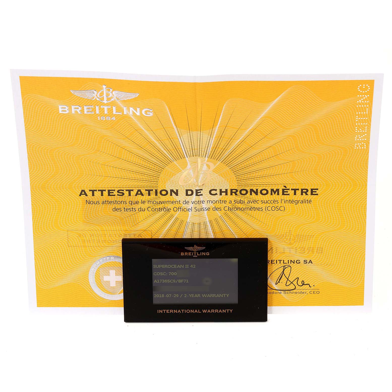 The image shows the certificate and international warranty card for the Breitling Superocean A17365 Men's Stainless Steel Black Dial A17365 Men's Stainless Steel Black Dial model.