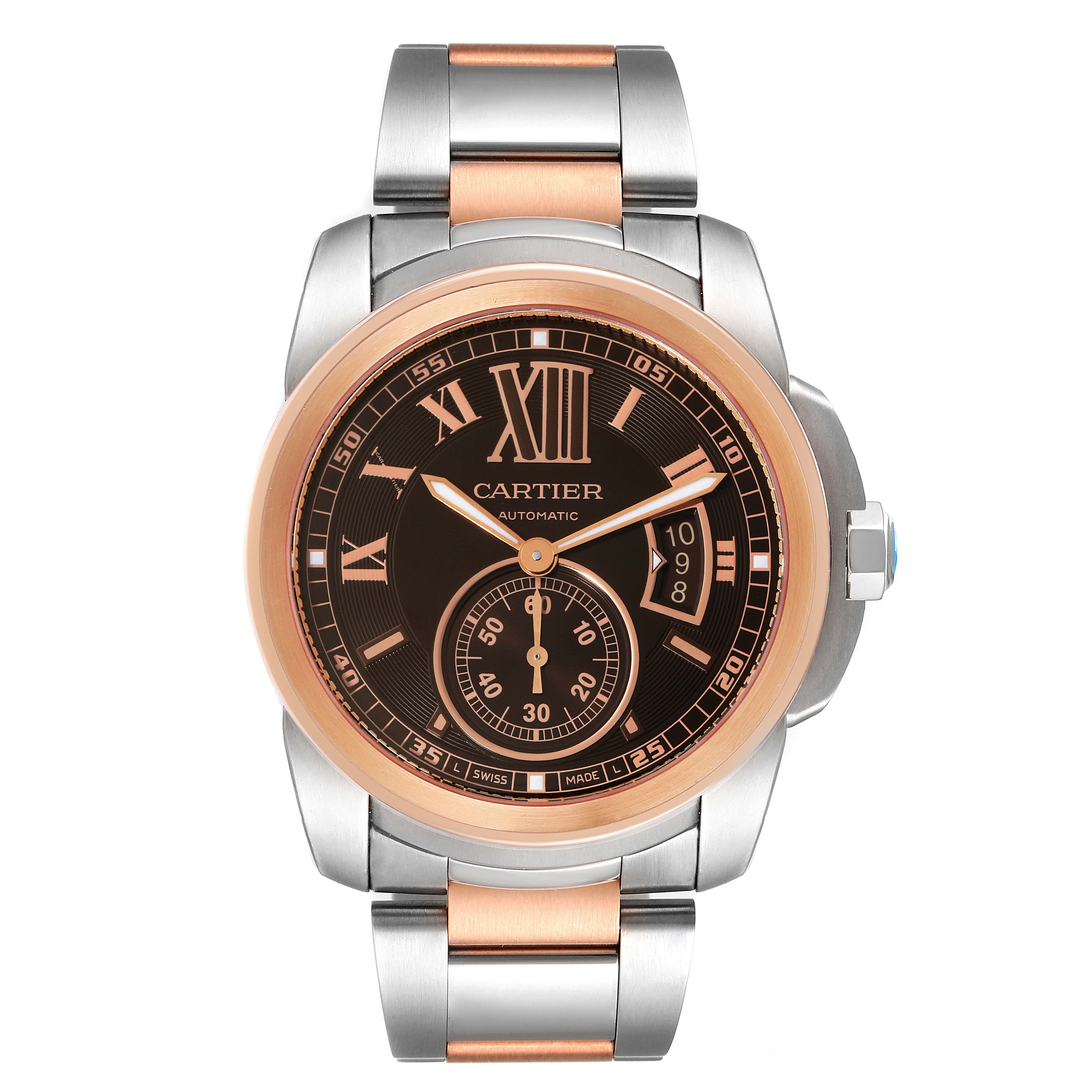 This image shows a front view of a Calibre de Cartier watch by Cartier, featuring a two-tone metal strap and a detailed dial.