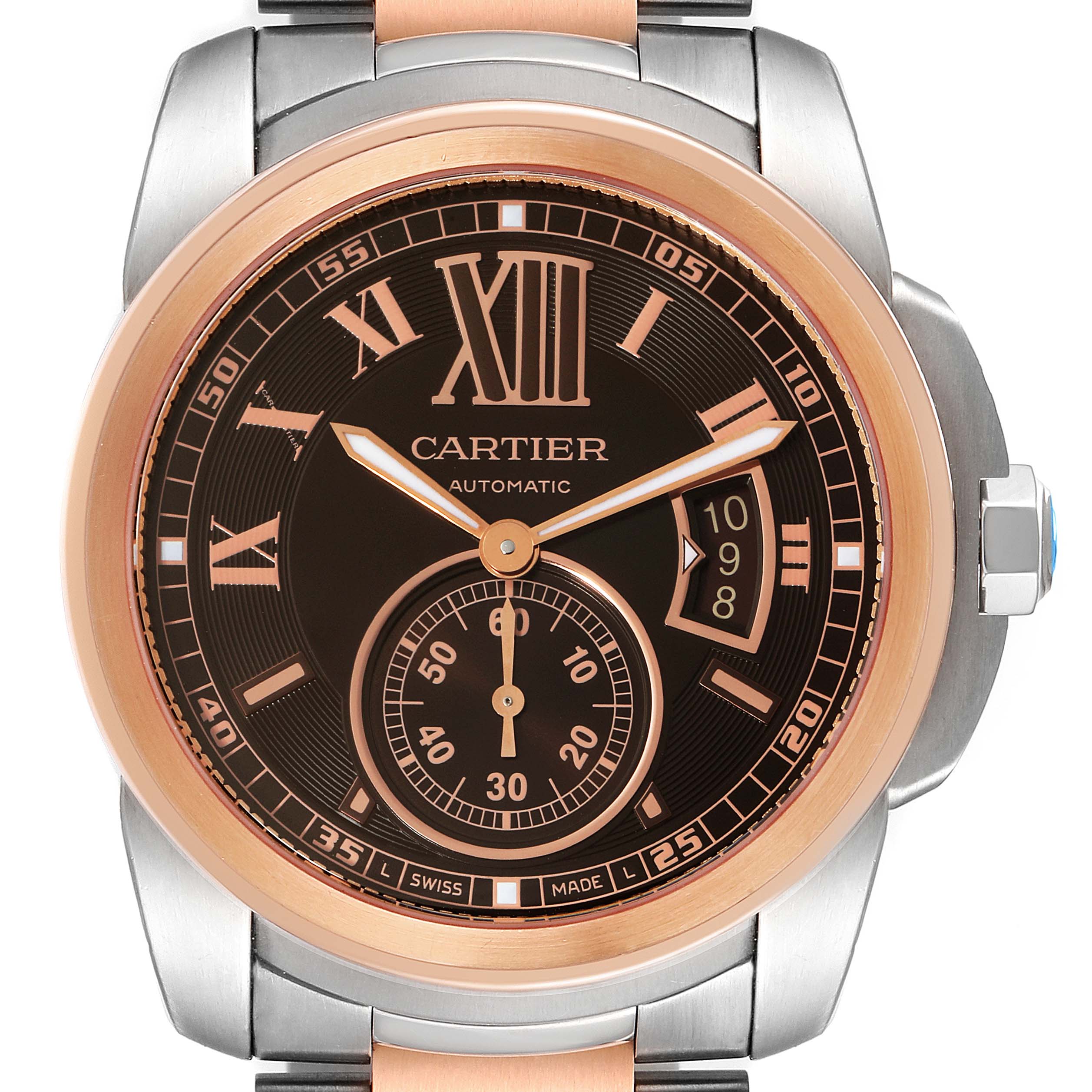 The image shows a front view of the Calibre de Cartier watch by Cartier, displaying its face, hands, and date window.