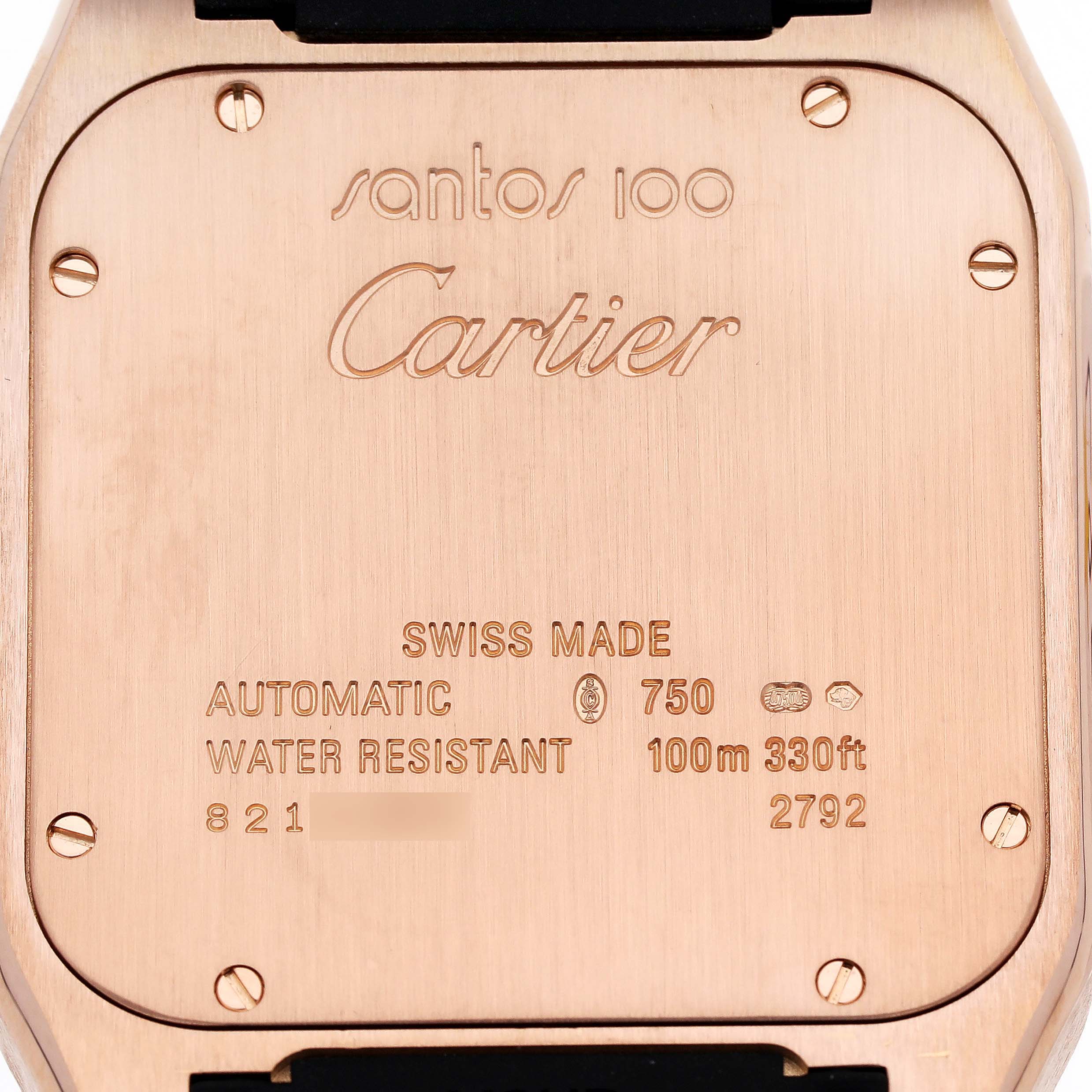 The image shows the back case of a Cartier Santos W20124U2 Men's Rose Gold Black Dial W20124U2 Men's Rose Gold Black Dial 100 watch with engravings and screws visible.