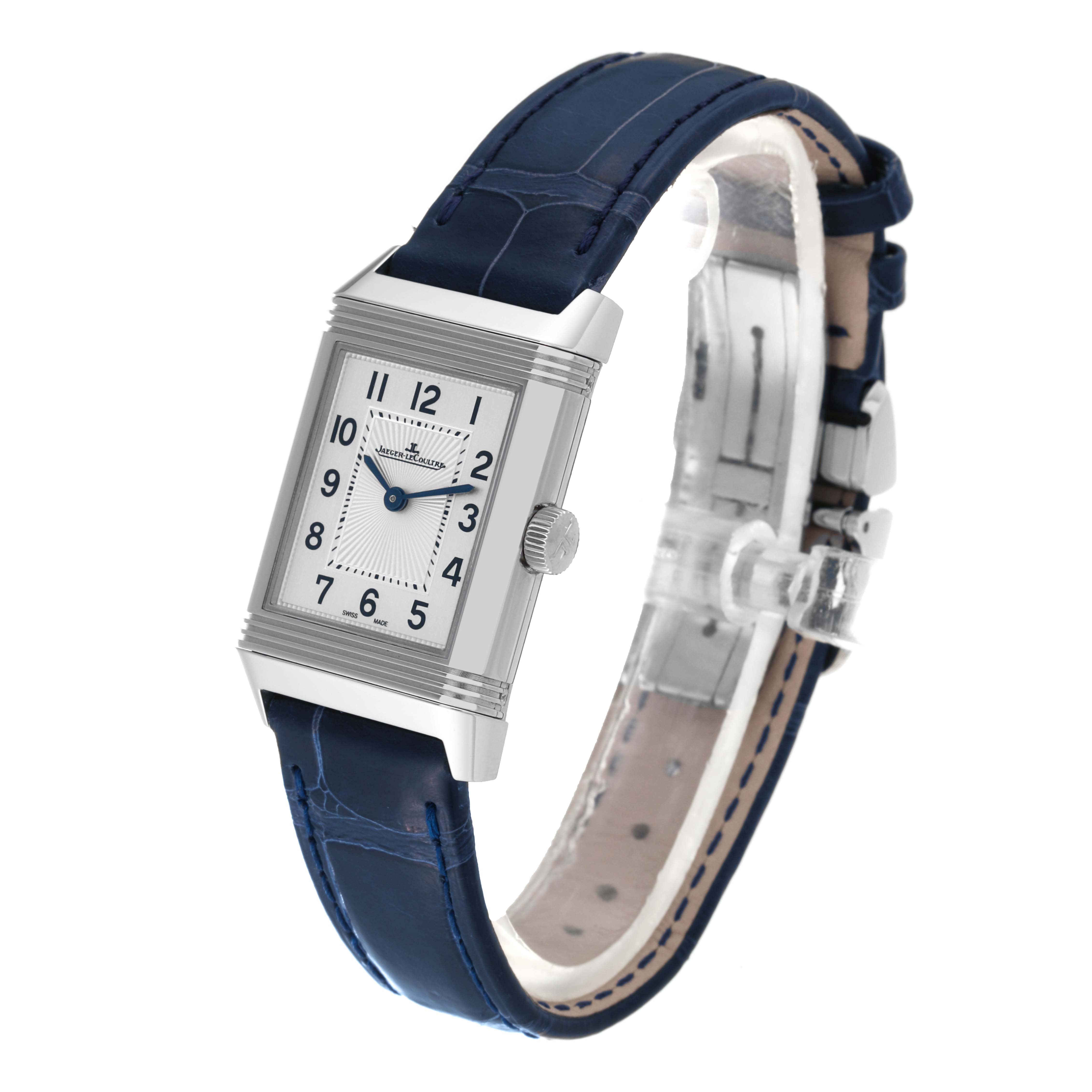 The image shows a front angle of a Jaeger LeCoultre Reverso Q2668432 Women's Stainless Steel Silver Dial Q2668432 Women's Stainless Steel Silver Dial watch with a blue leather strap and silver rectangular face.