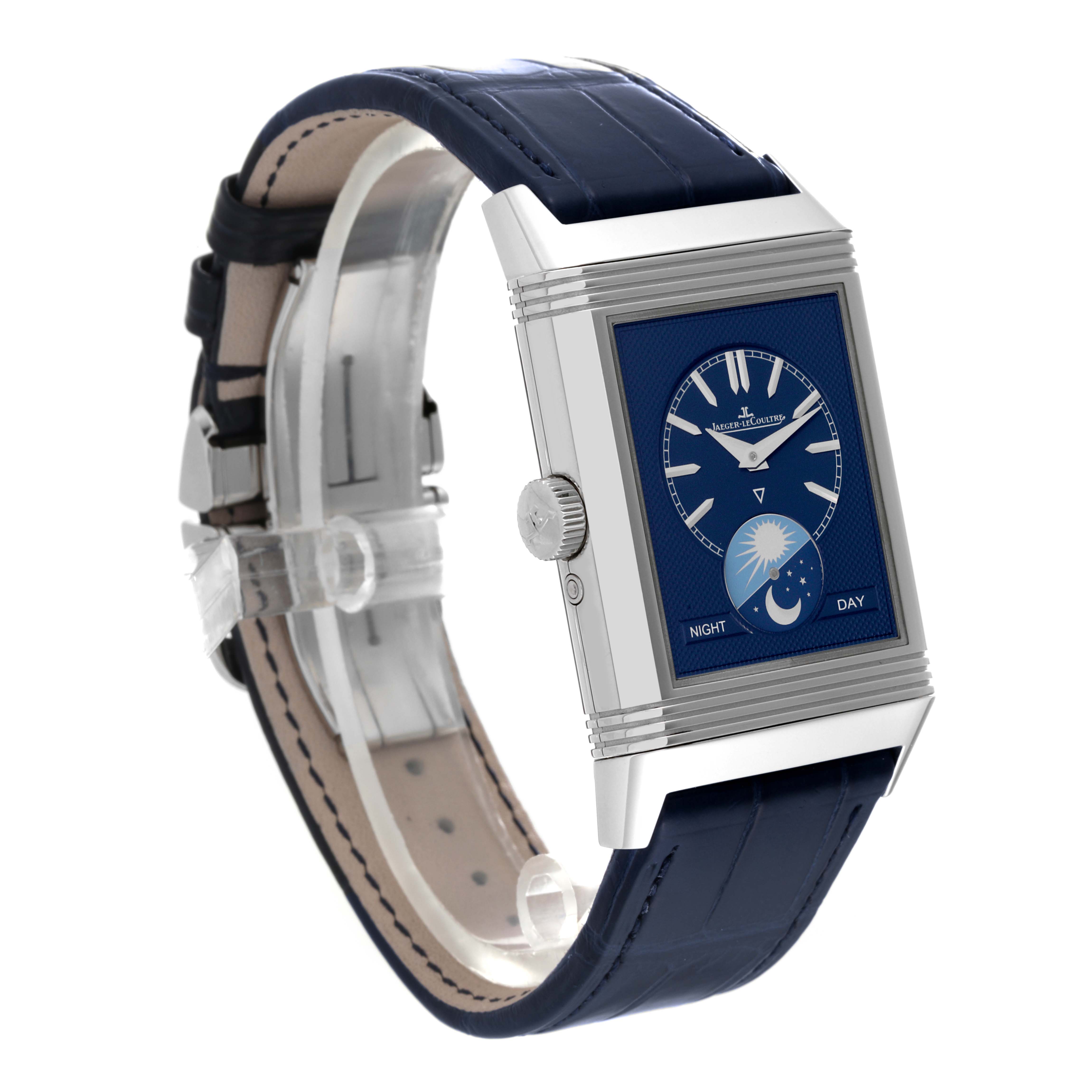 The image shows a Jaeger-LeCoultre Reverso watch at a three-quarter angle, displaying its face, case, crown, and leather strap.