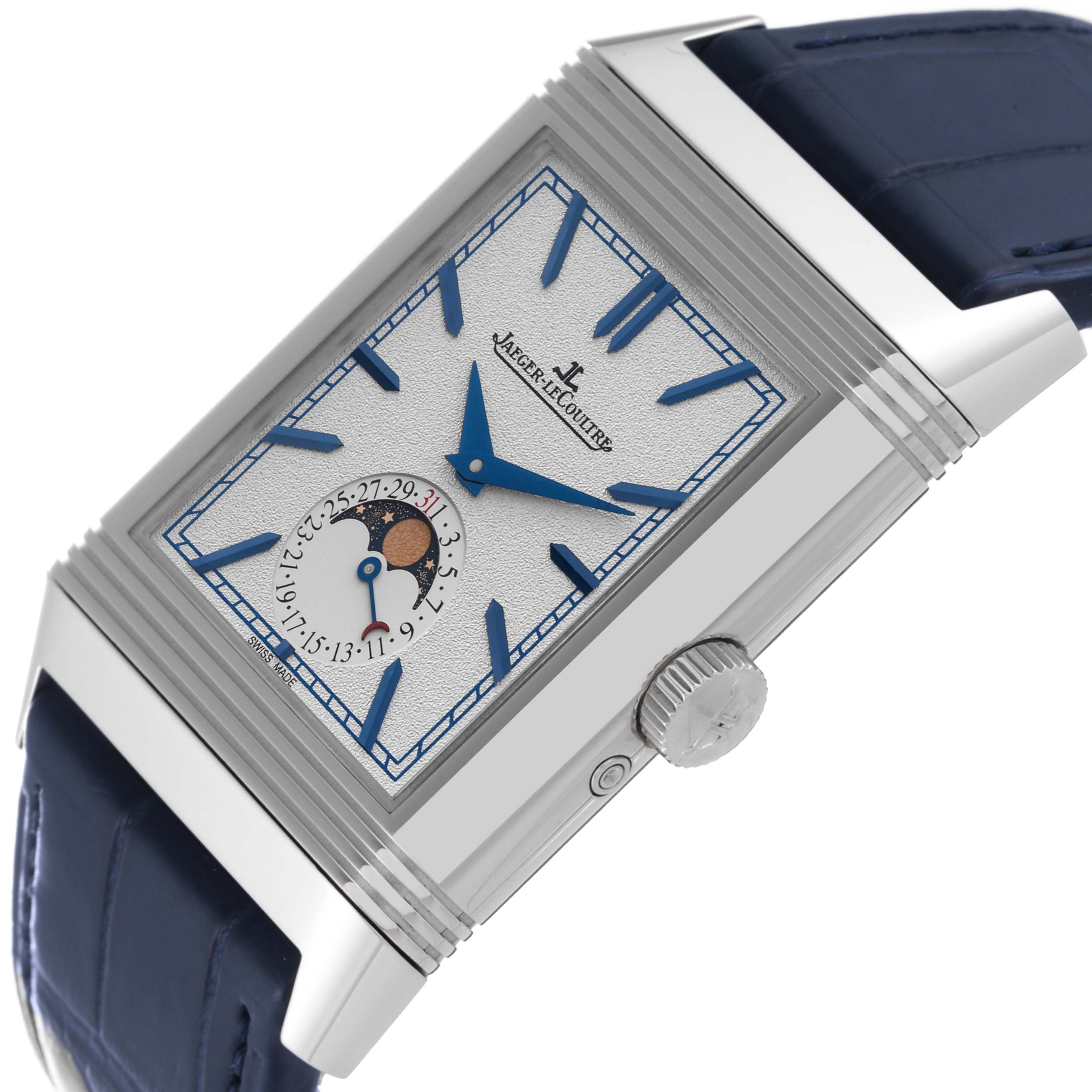 The image shows a front-angled view of the Jaeger LeCoultre Reverso Q3958420 Men
s Stainless Steel Silver Dial Q3958420 Men
s Stainless Steel Silver Dial watch, highlighting its dial, moon phase display, and crown.