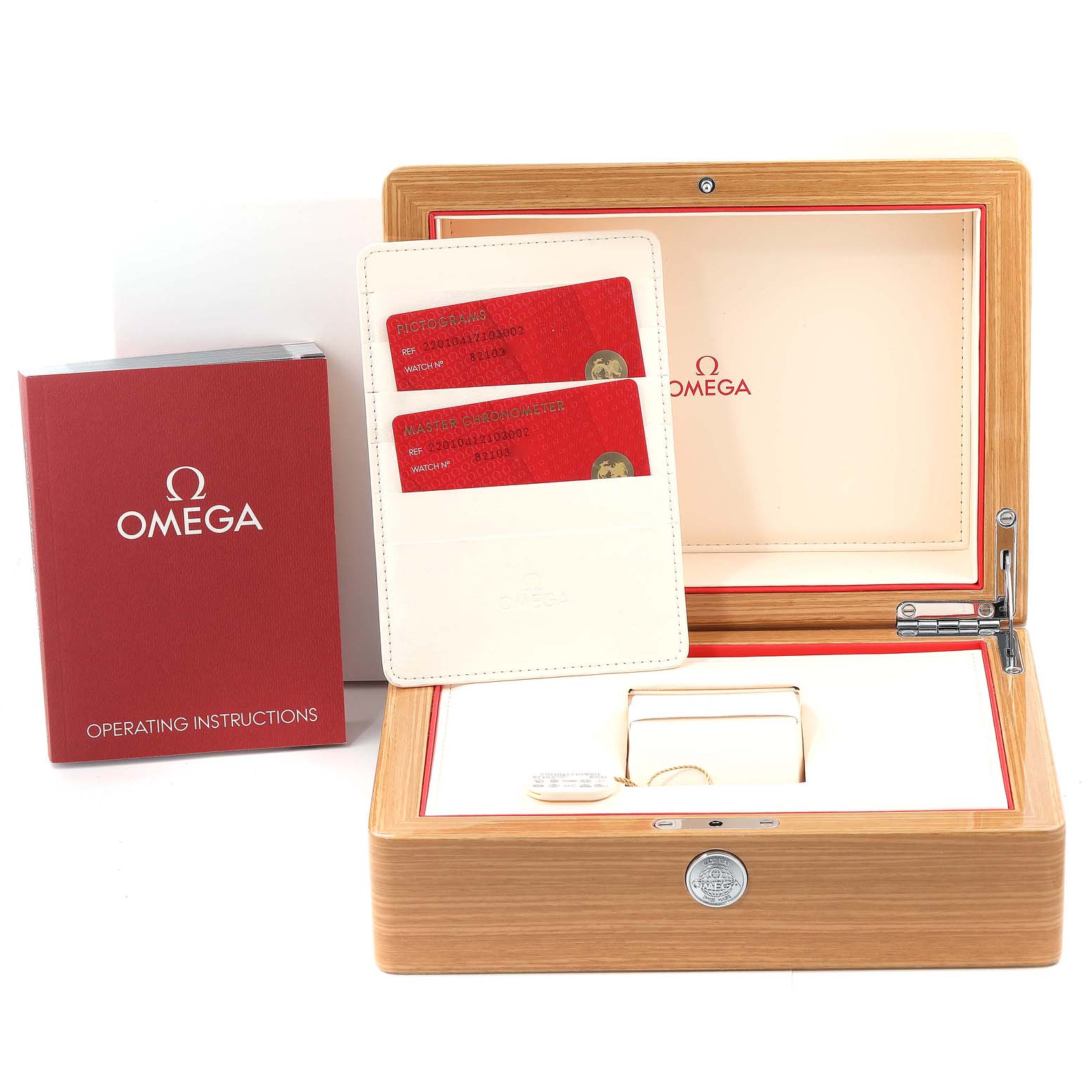 The image shows the packaging for the Omega Aqua Terra 220.10.41.21.03.002 Men
s Stainless Steel Blue Dial 220.10.41.21.03.002 Men
s Stainless Steel Blue Dial watch including the box, cards, and operating instructions.
