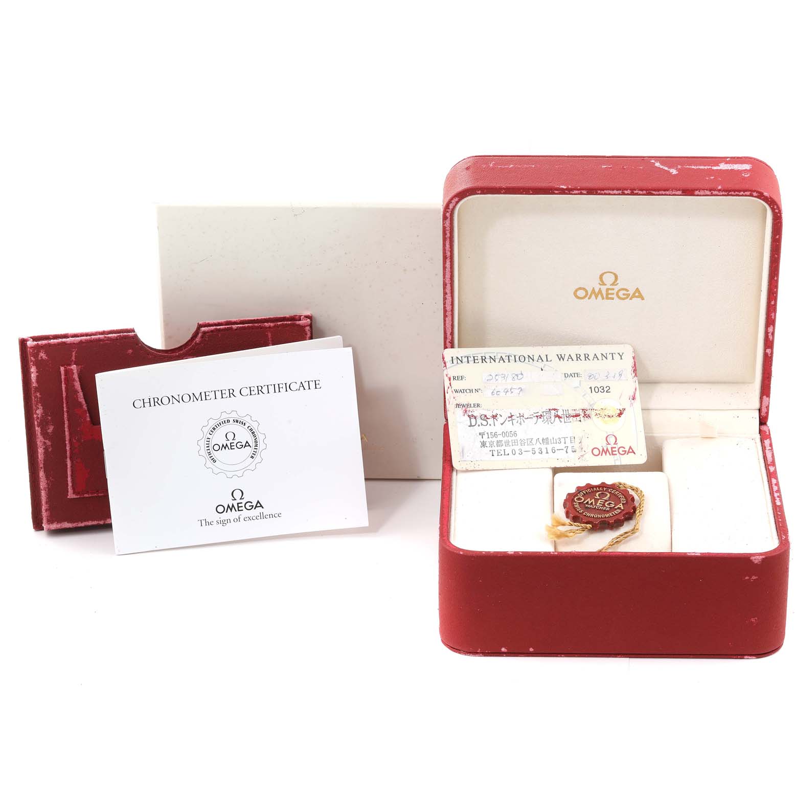 This image shows the box, international warranty card, and chronometer certificate for an Omega Seamaster 2531.80.00 Men's Stainless Steel Blue Dial 2531.80.00 Men's Stainless Steel Blue Dial watch.