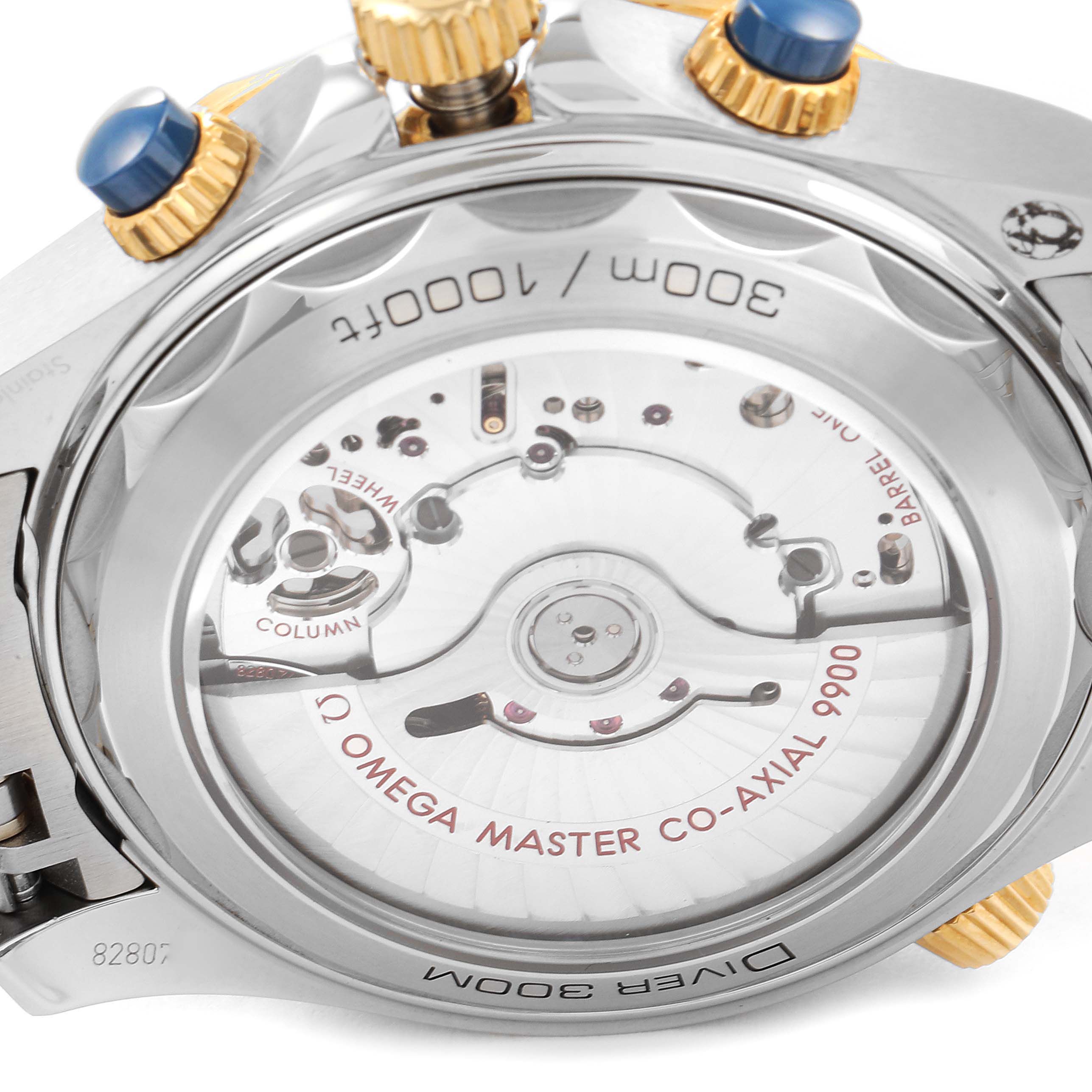 This image shows the back view of an Omega Seamaster 210.20.44.51.03.001 Men's Steel and Gold (two tone) Blue Dial 210.20.44.51.03.001 Men's Steel and Gold (two tone) Blue Dial watch displaying the Omega Master Co-Axial 9900 movement.