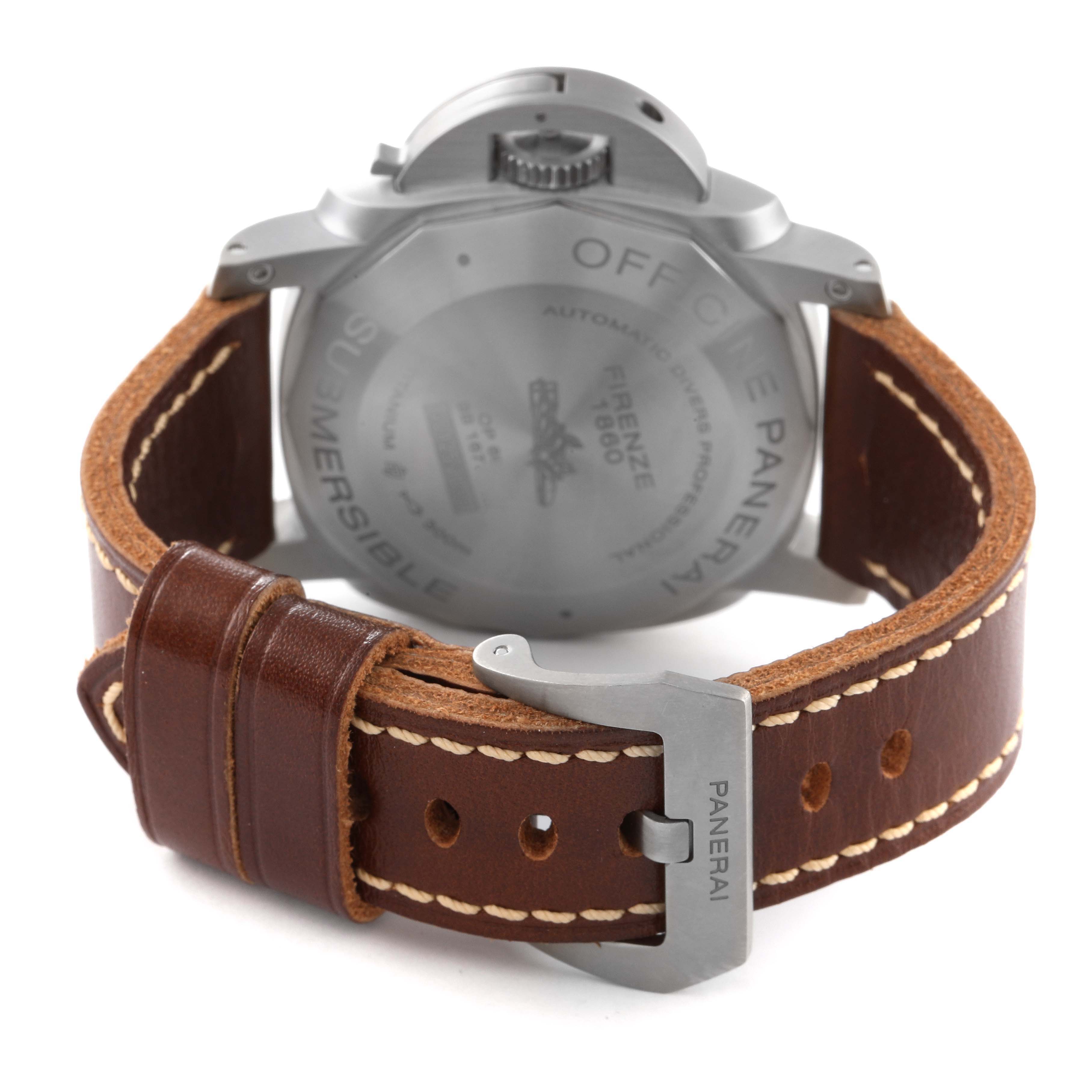 This image shows the back view of a Panerai Submersible PAM00569 Men's Titanium Black Dial PAM00569 Men's Titanium Black Dial model watch, featuring its case back and leather strap with a buckle.