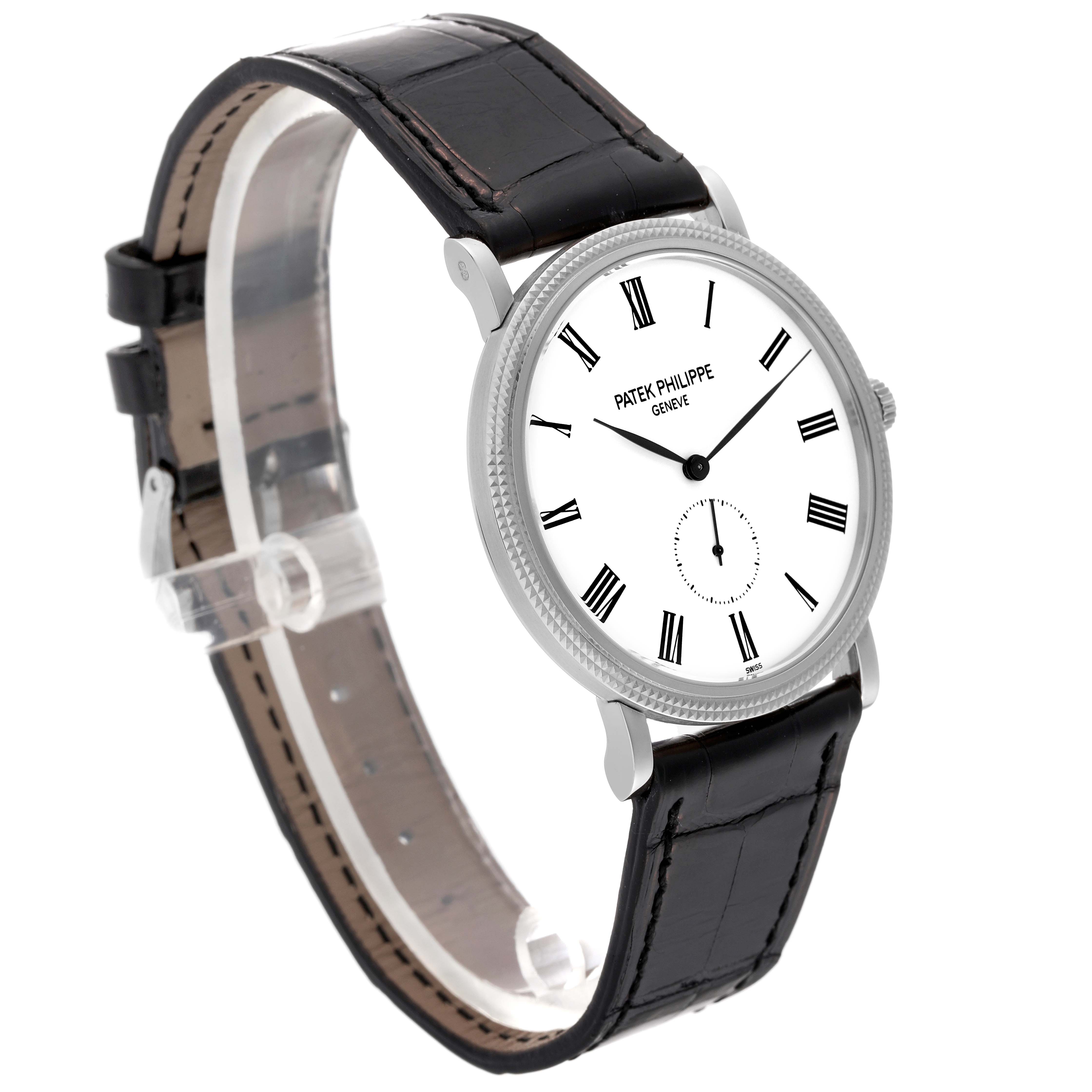 The image shows a Patek Philippe Calatrava 5119G Men's Yellow Gold White Dial 5119G Men's Yellow Gold White Dial watch at an angle, highlighting the dial, bezel, and leather strap.