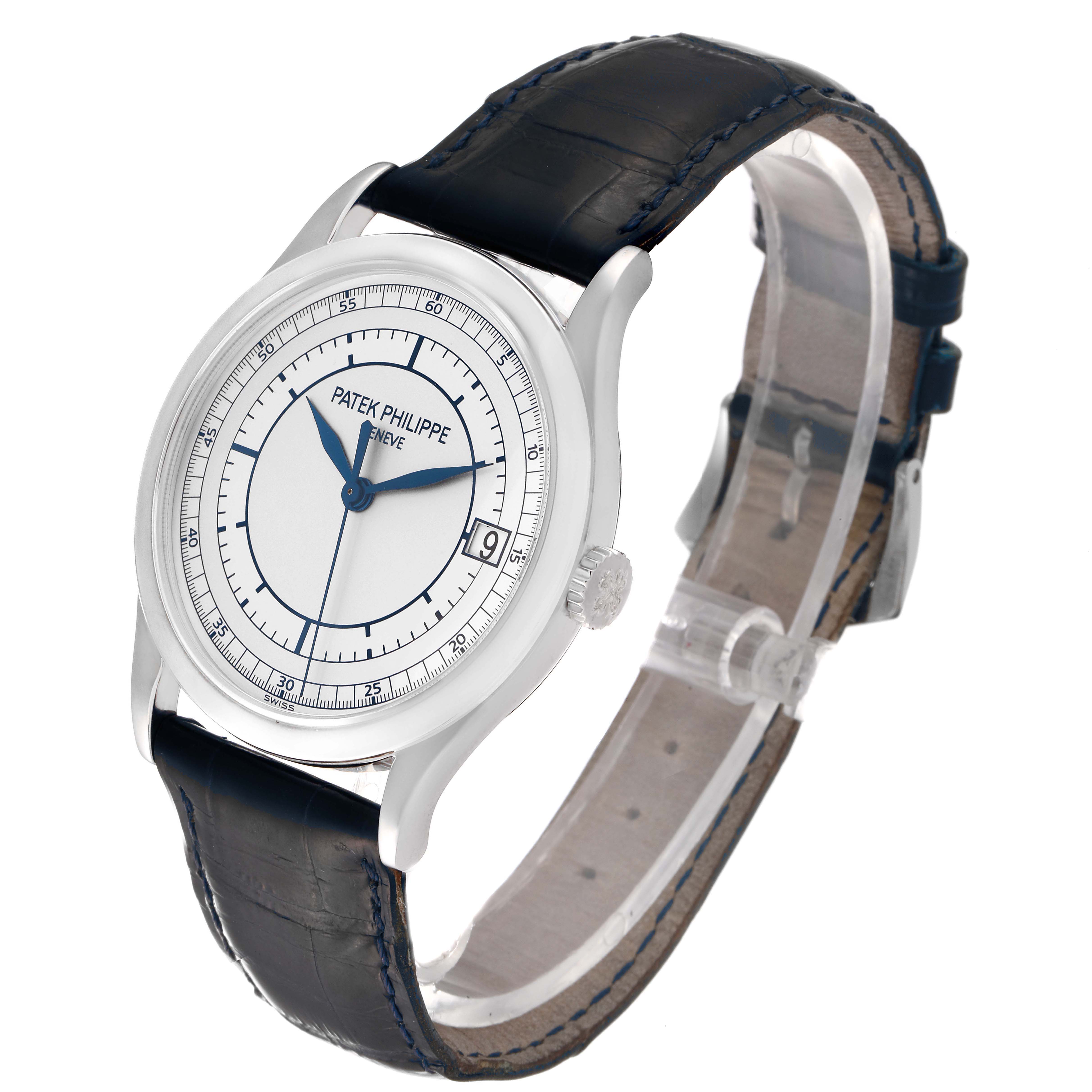 This image shows a Patek Philippe Calatrava 5296G-001 Men's White Gold Silver Dial 5296G-001 Men's White Gold Silver Dial watch at a three-quarter view, displaying the dial, crown, and strap.