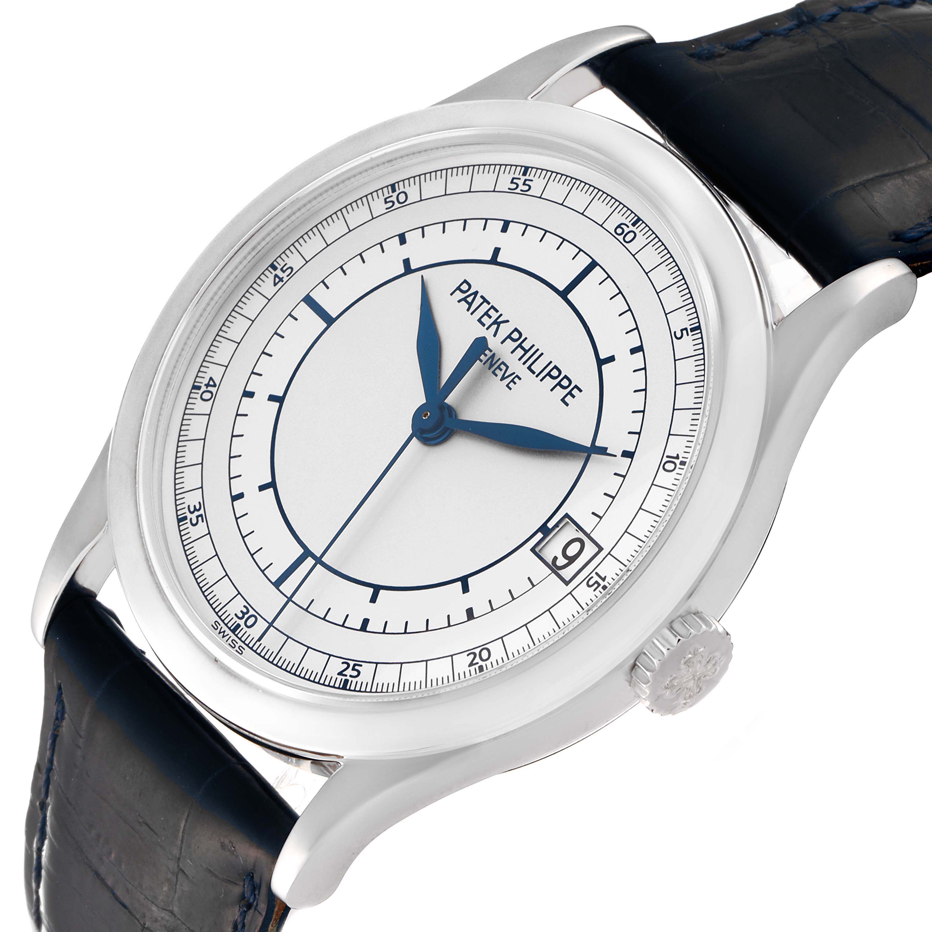 This image displays a Patek Philippe Calatrava 5296G-001 Men's White Gold Silver Dial 5296G-001 Men's White Gold Silver Dial watch at a three-quarter angle showcasing the face, hands, dial, crown, and strap.