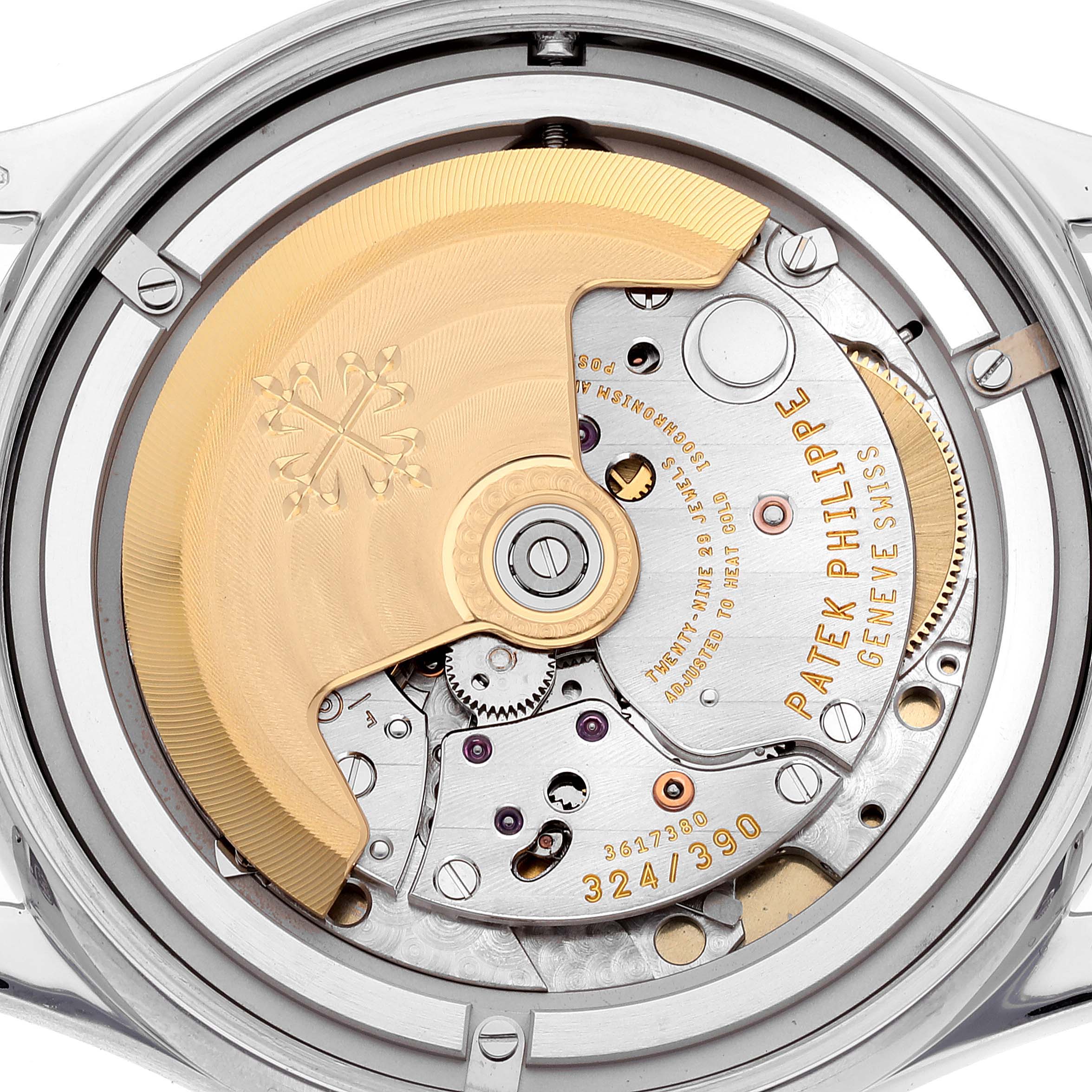 This image captures the back view of the Patek Philippe Calatrava 5296G-001 Men's White Gold Silver Dial 5296G-001 Men's White Gold Silver Dial watch, showcasing its intricate movement.