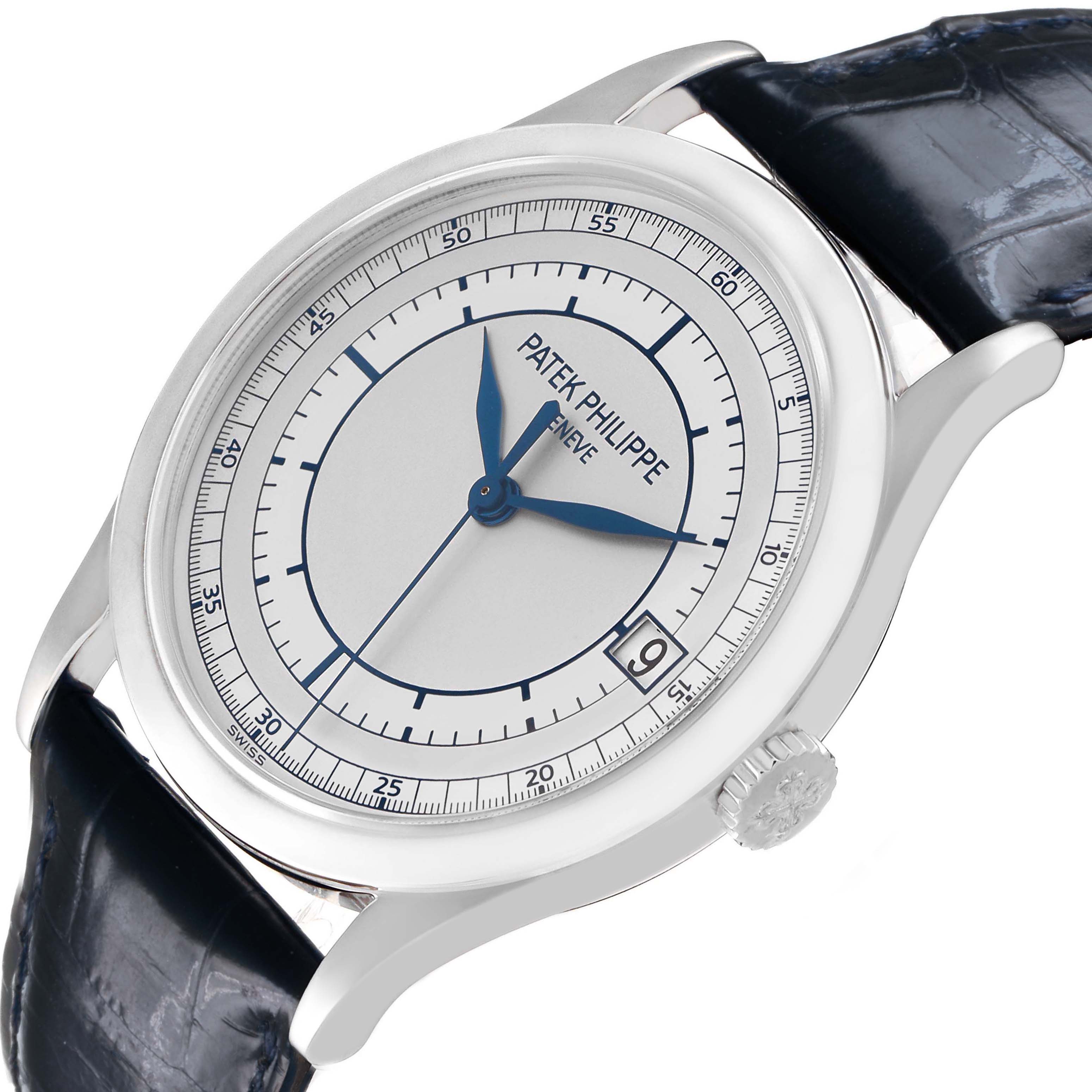 The Patek Philippe Calatrava 5296G-001 Men's White Gold Silver Dial watch is angled to show the face, crown, and part of the leather strap, highlighting its classic design.