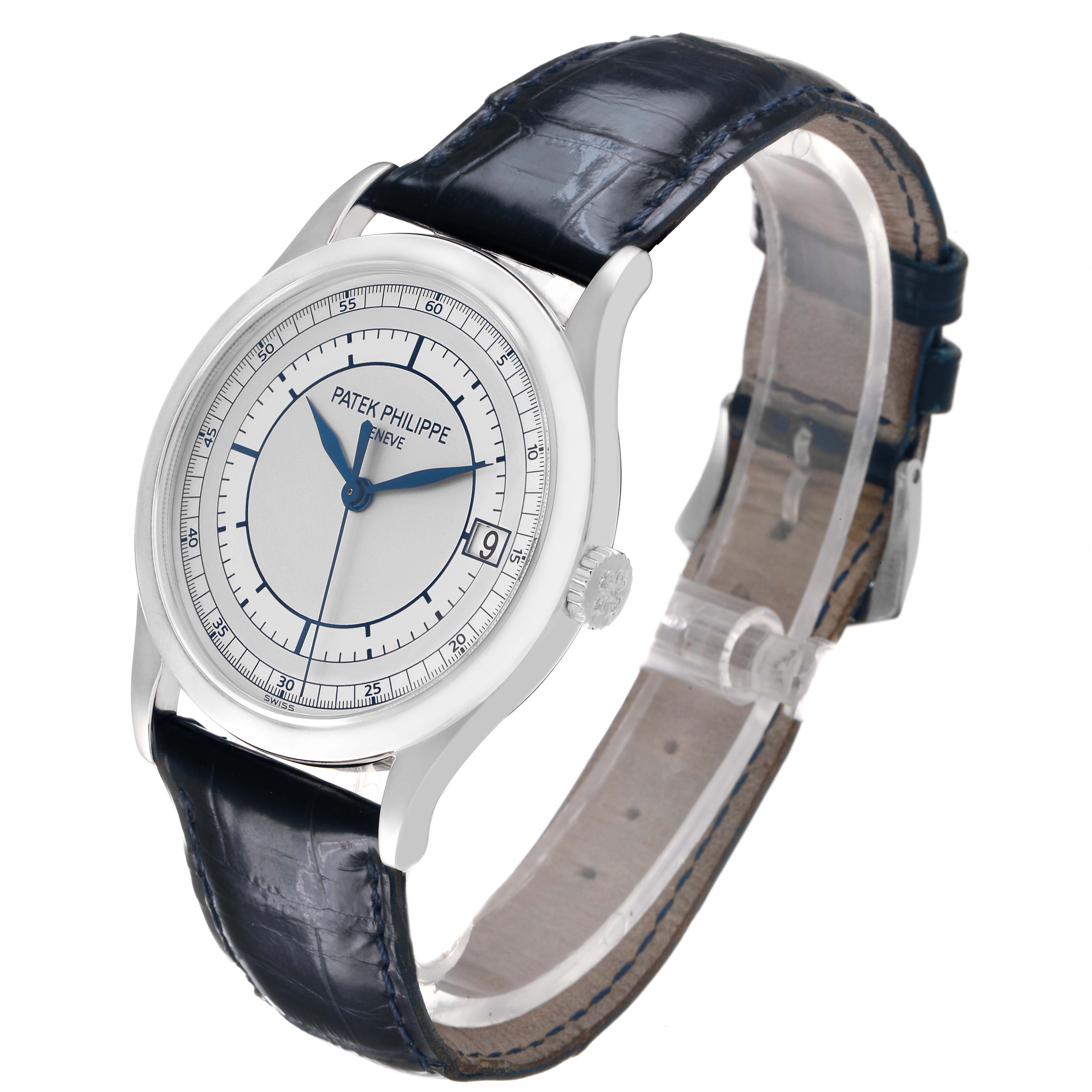 The Patek Philippe Calatrava 5296G-001 Men's White Gold Silver Dial watch is shown at a three-quarter angle, highlighting the face, crown, and strap.