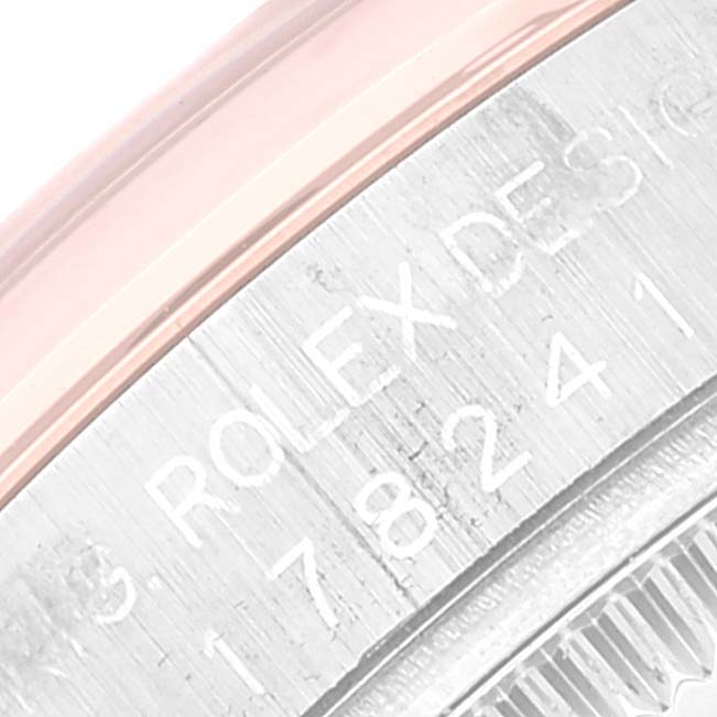 The image shows an angled close-up of the watch's case side, displaying the engraved model number and "Rolex" branding.