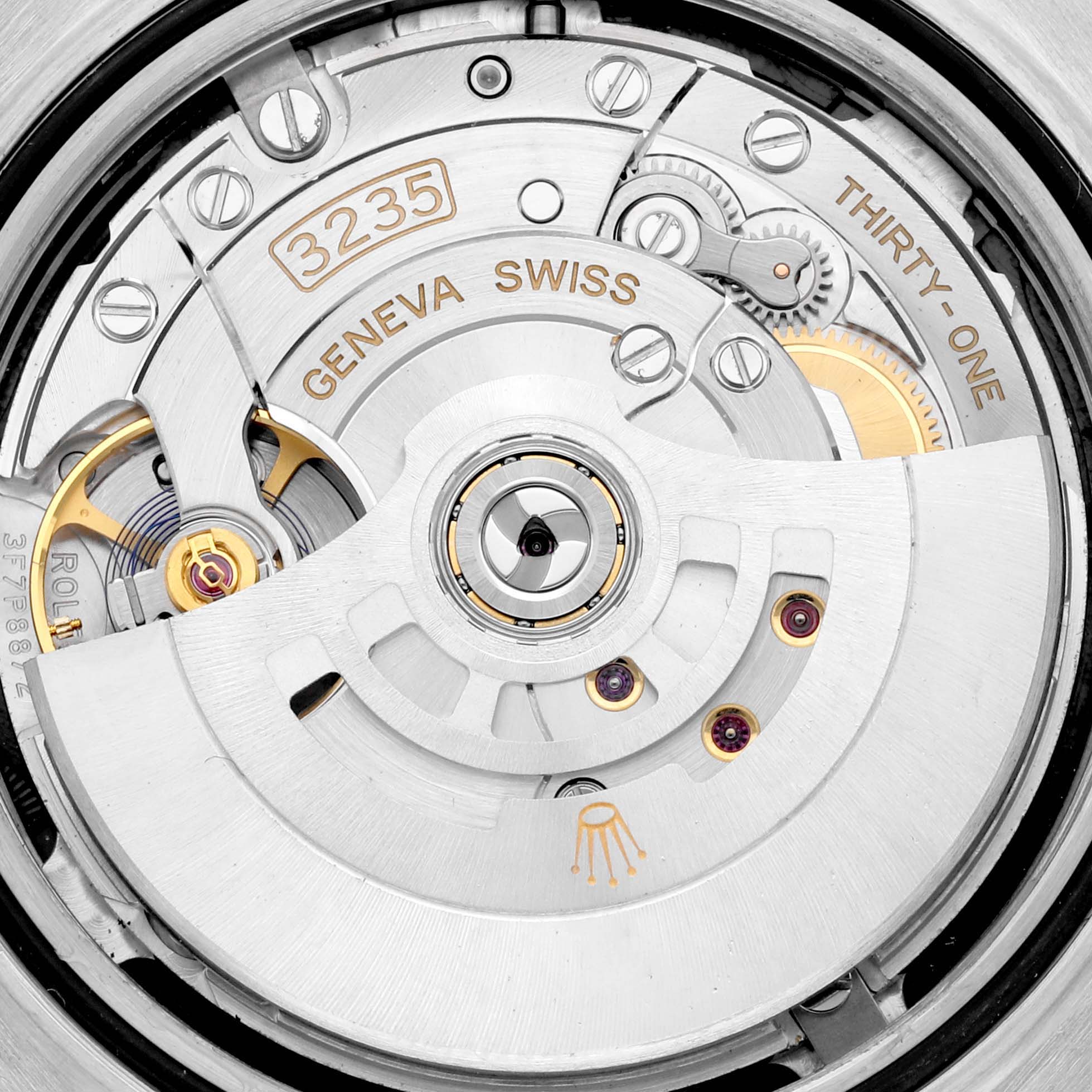 The image shows the movement mechanism from the back of a Rolex Datejust 41 126300 Men
s Stainless Steel Black Dial 126300 Men
s Stainless Steel Black Dial watch, highlighting the intricate internal components.